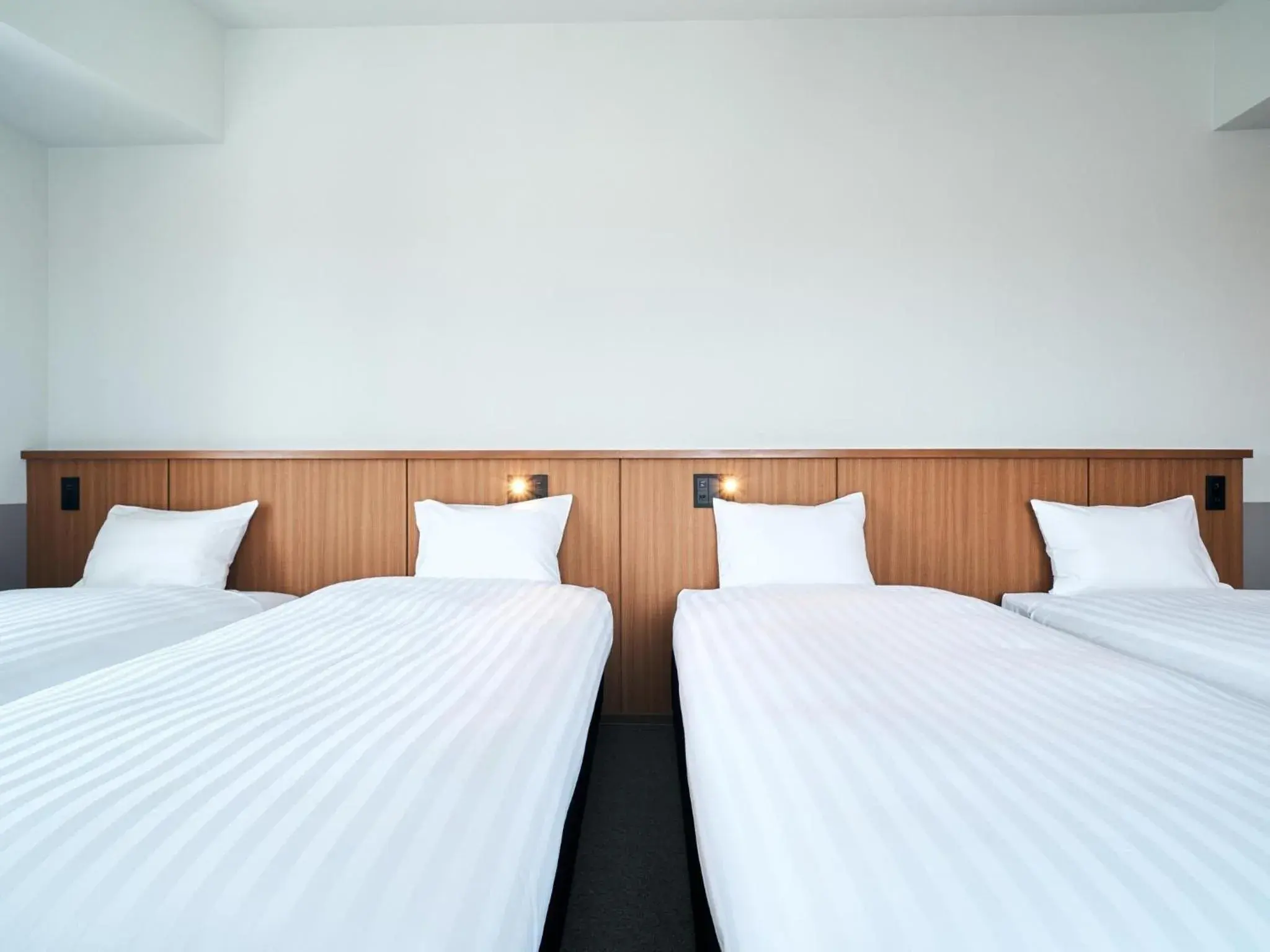 Bed in Rakuten STAY Naha Yachimun Street - standard 6 Bed Room Bed in Rakuten STAY Naha Yachimun Street - standard 6 Bed Room