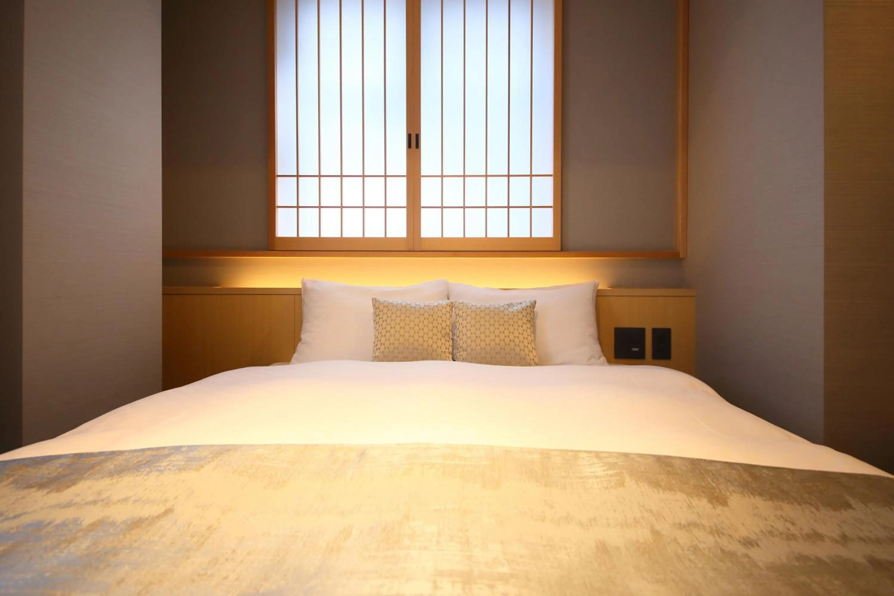 Bed in KYOTO GION HOTEL