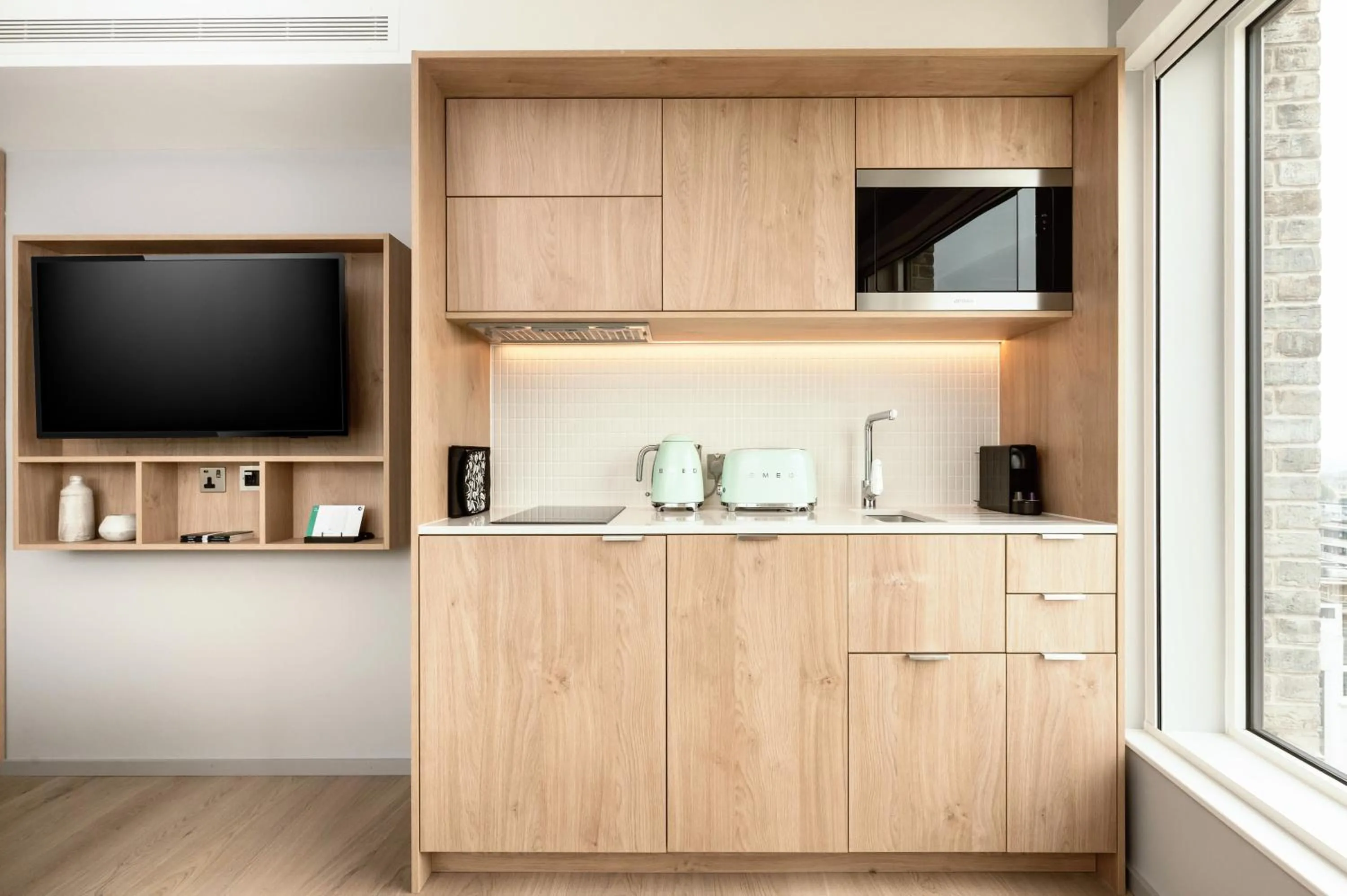 Kitchen or kitchenette in Wilde Aparthotels London Aldgate Tower Bridge