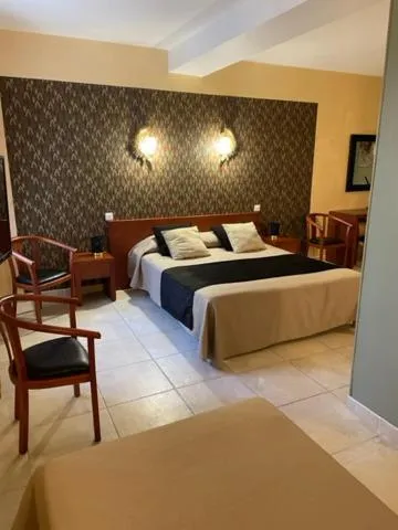 Bed in Hôtel Bon Encontre