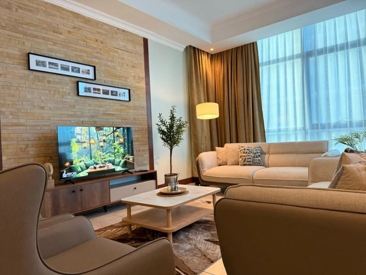 Communal lounge/ TV room in Fairview Luxury Apartments