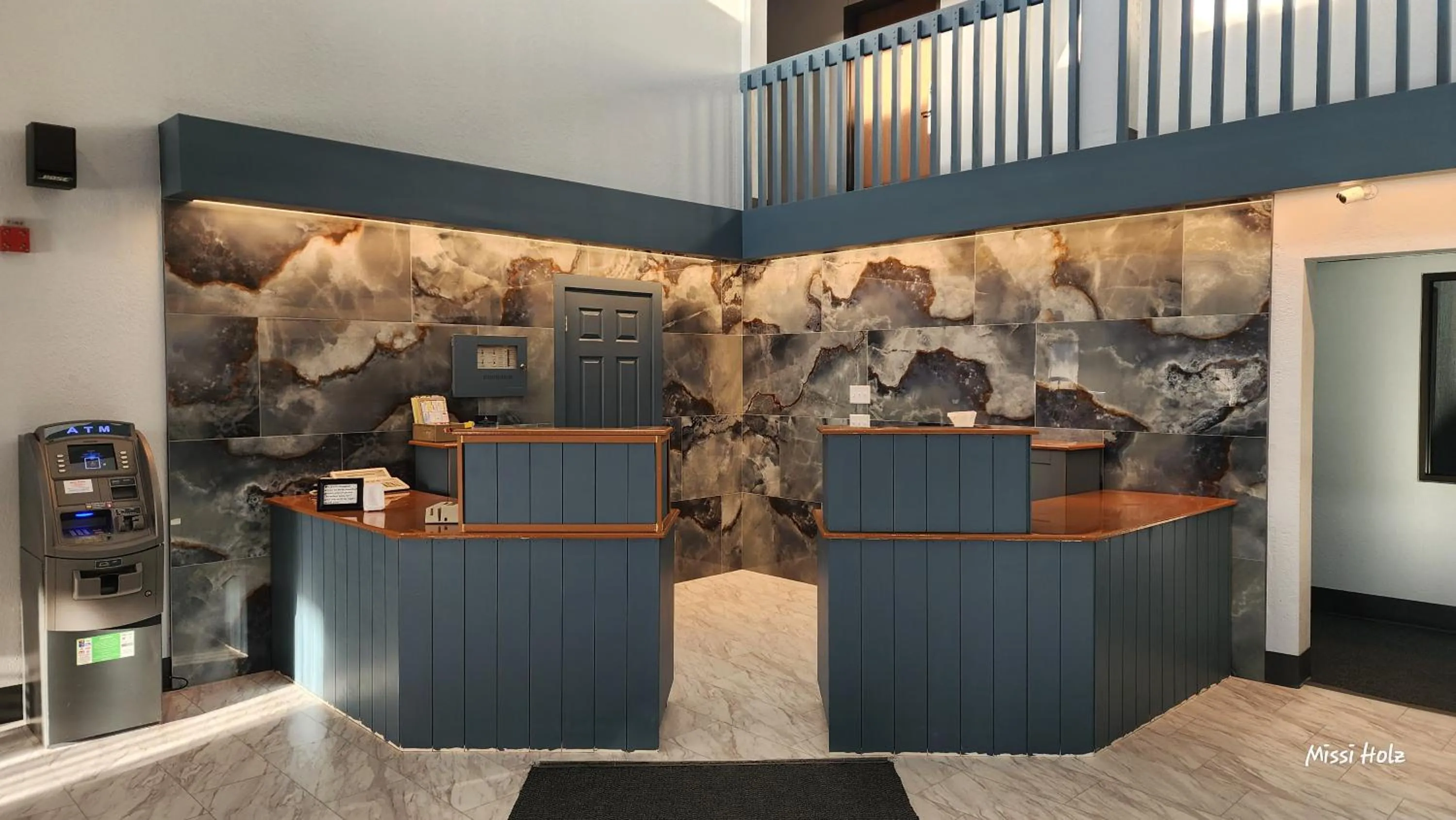 Lobby or reception in The Oasis Hotel & Bar