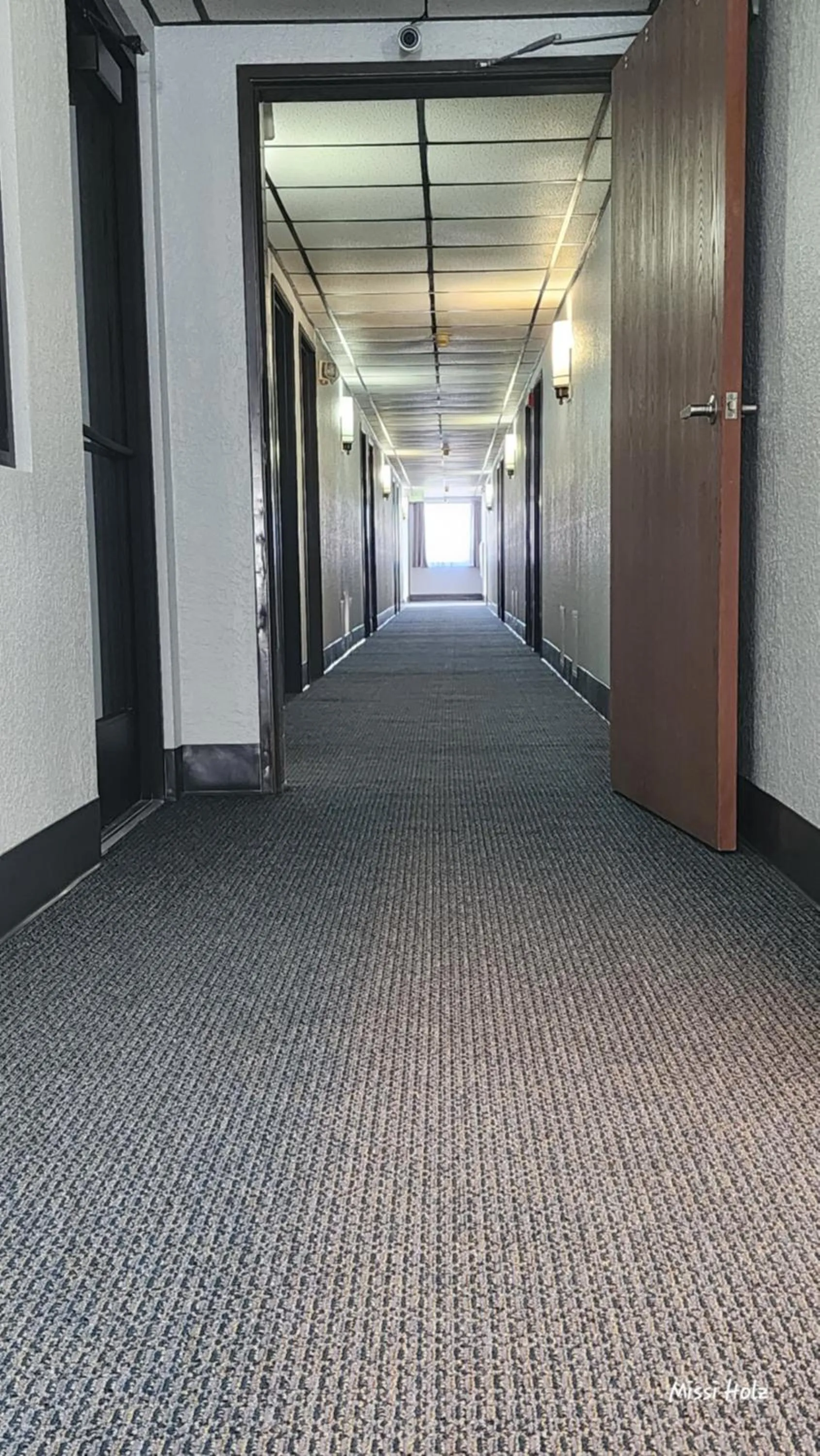 Property building in The Oasis Hotel & Bar