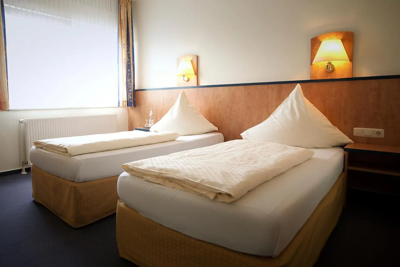 Bed in Hotel Haus Union