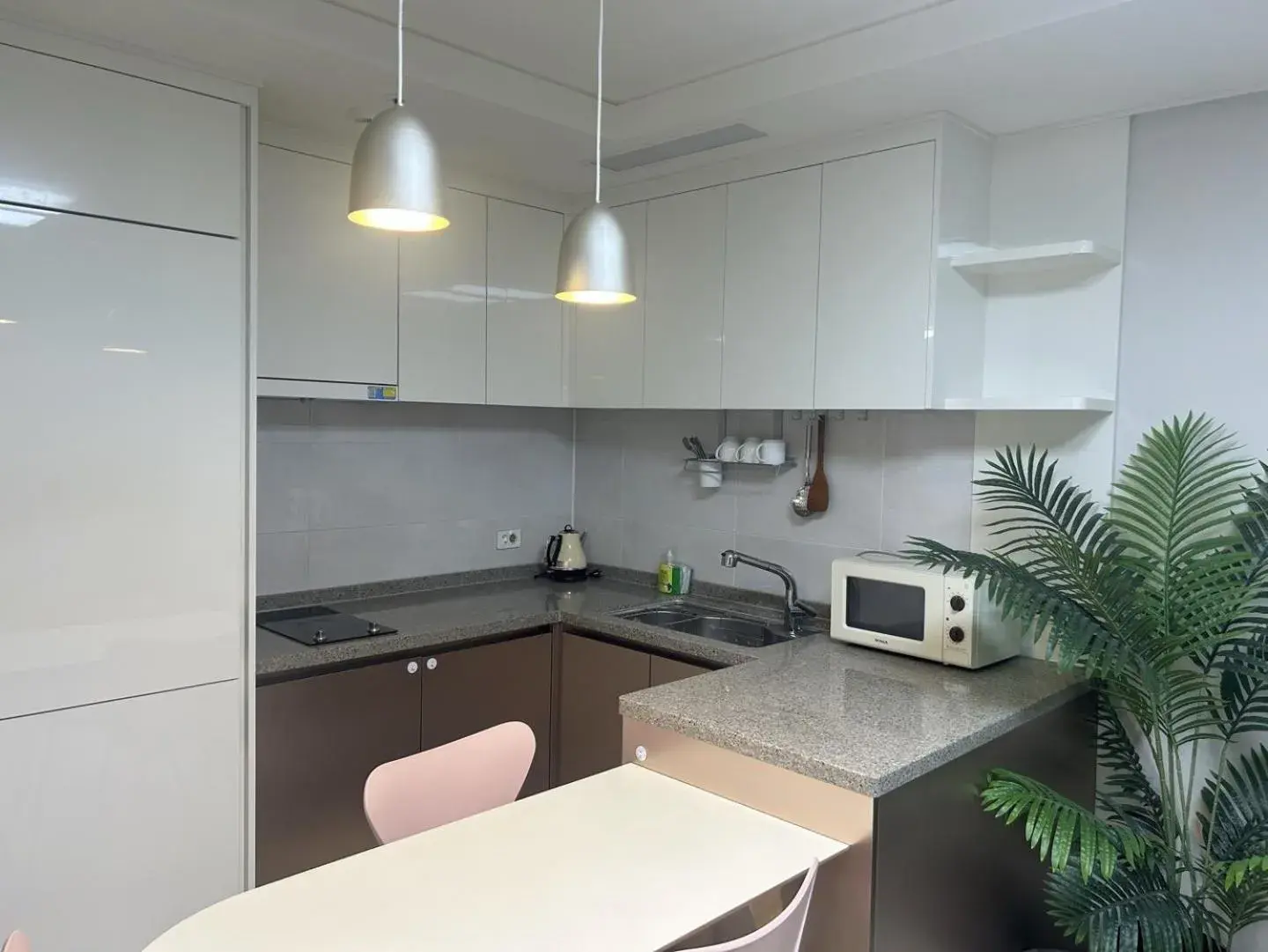 Kitchen or kitchenette in Landmark Stay in Songdo Kitchen or kitchenette in Landmark Stay in Songdo