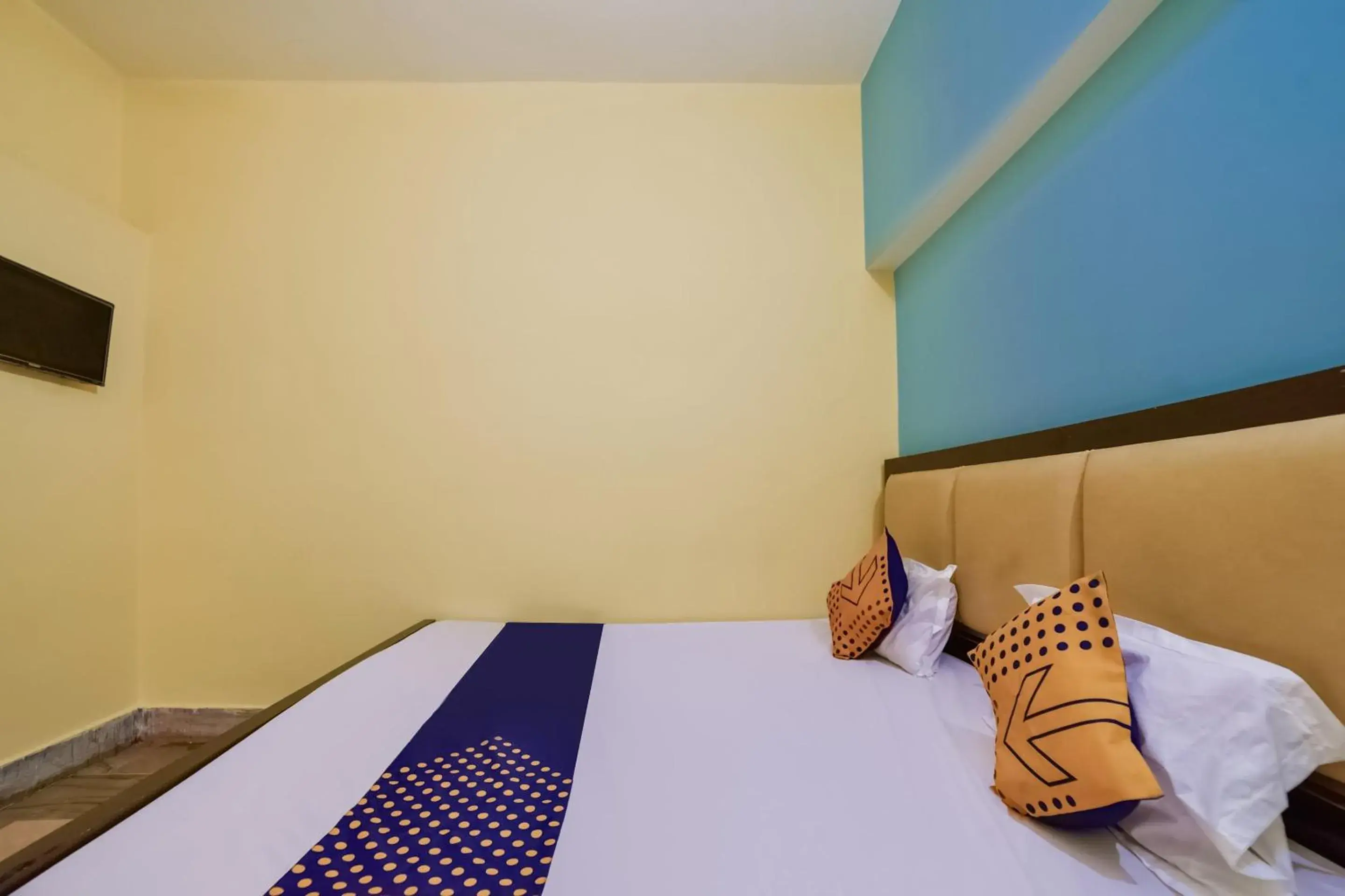 Bedroom in SPOT ON Luv-kush Inn Bedroom in SPOT ON Luv-kush Inn