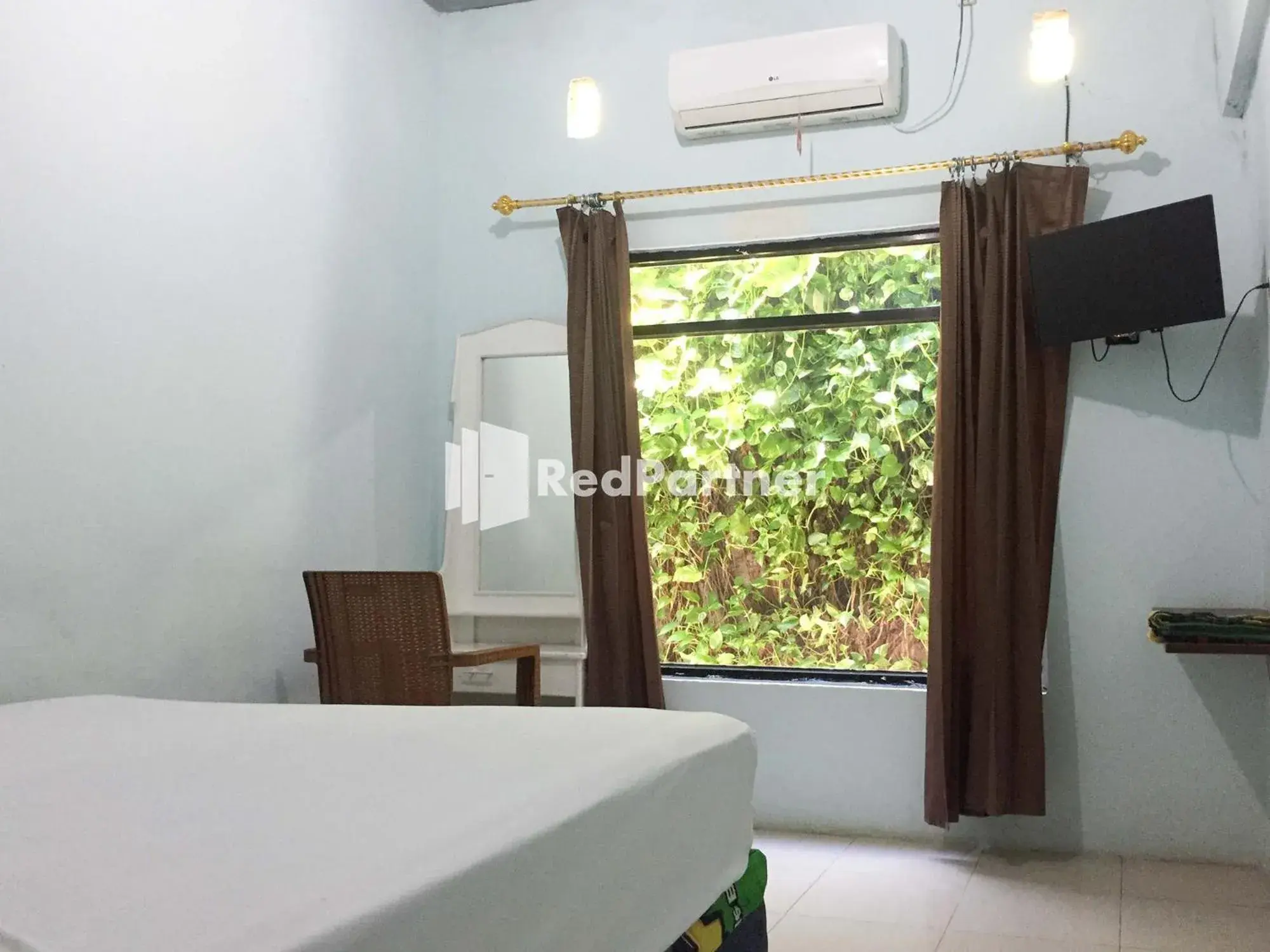 Bed in Wisma Andini Palopo RedPartner Bed in Wisma Andini Palopo RedPartner