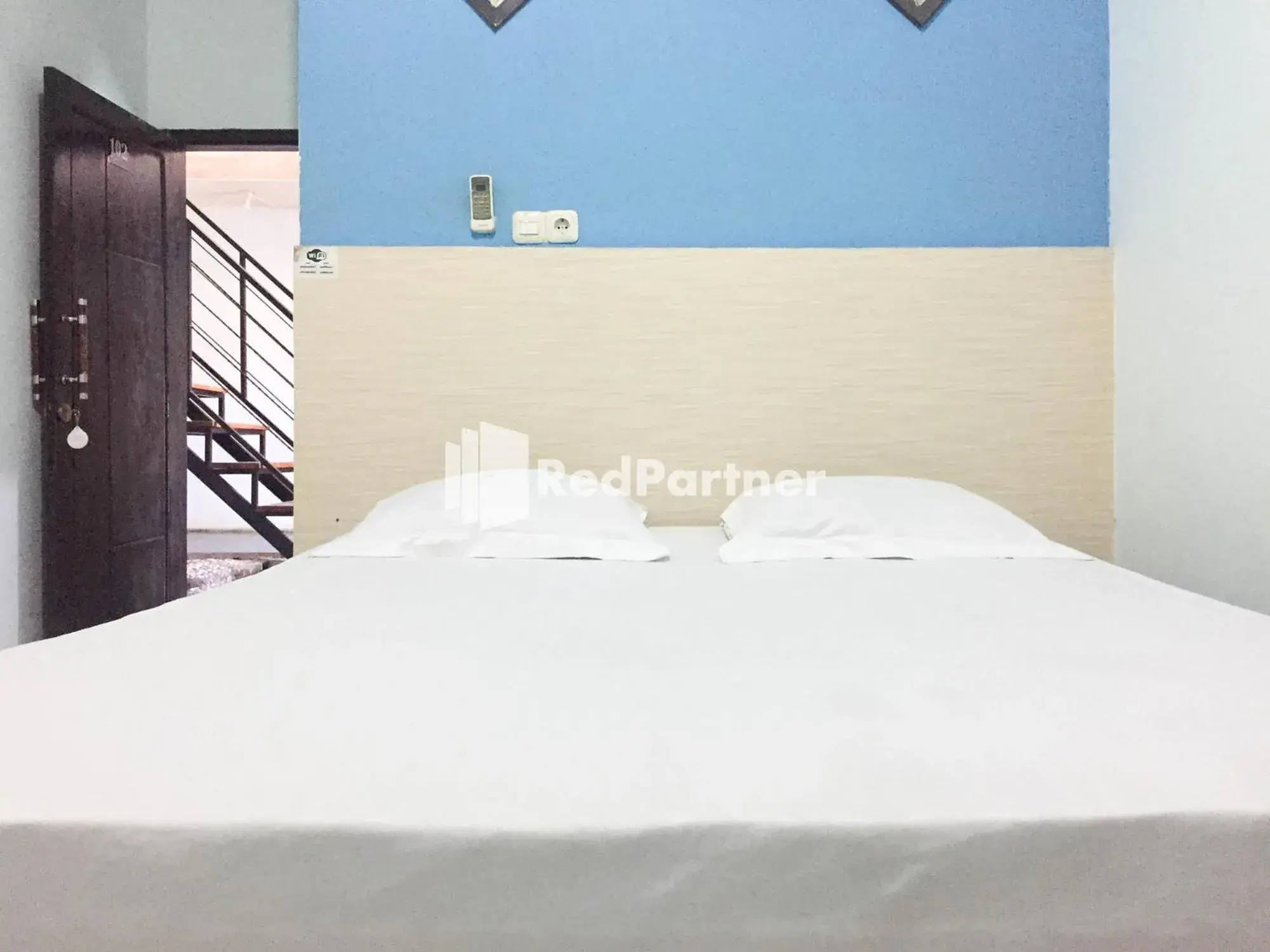 Bed in Wisma Andini Palopo RedPartner Bed in Wisma Andini Palopo RedPartner