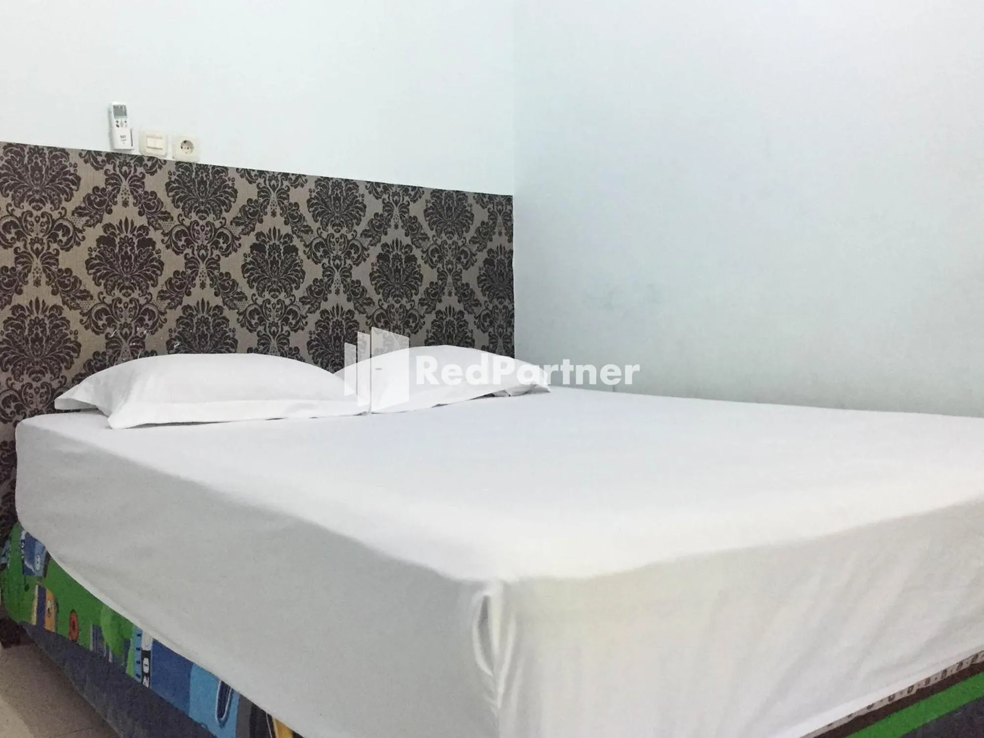 Bed in Wisma Andini Palopo RedPartner