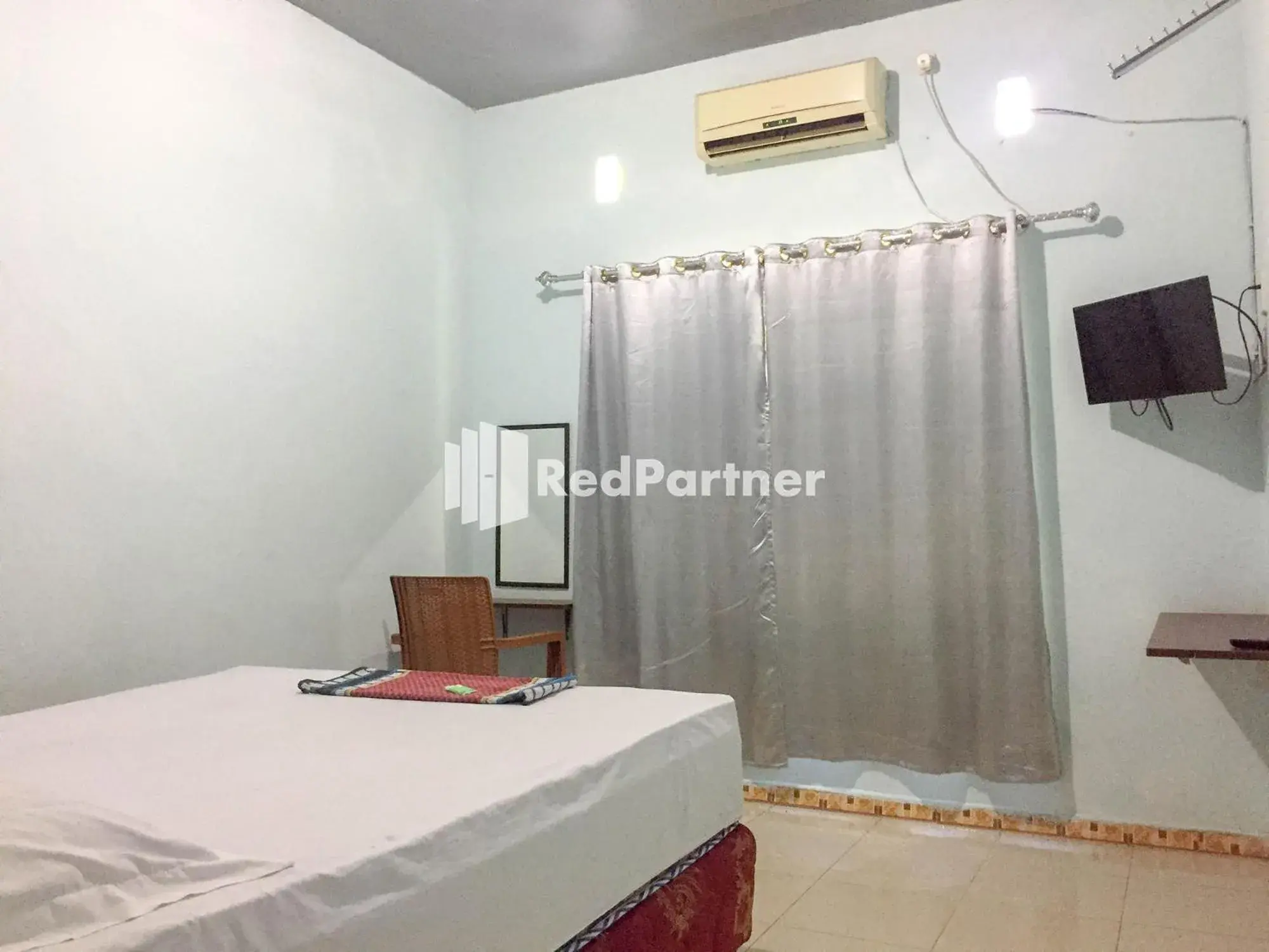 Bed in Wisma Andini Palopo RedPartner Bed in Wisma Andini Palopo RedPartner