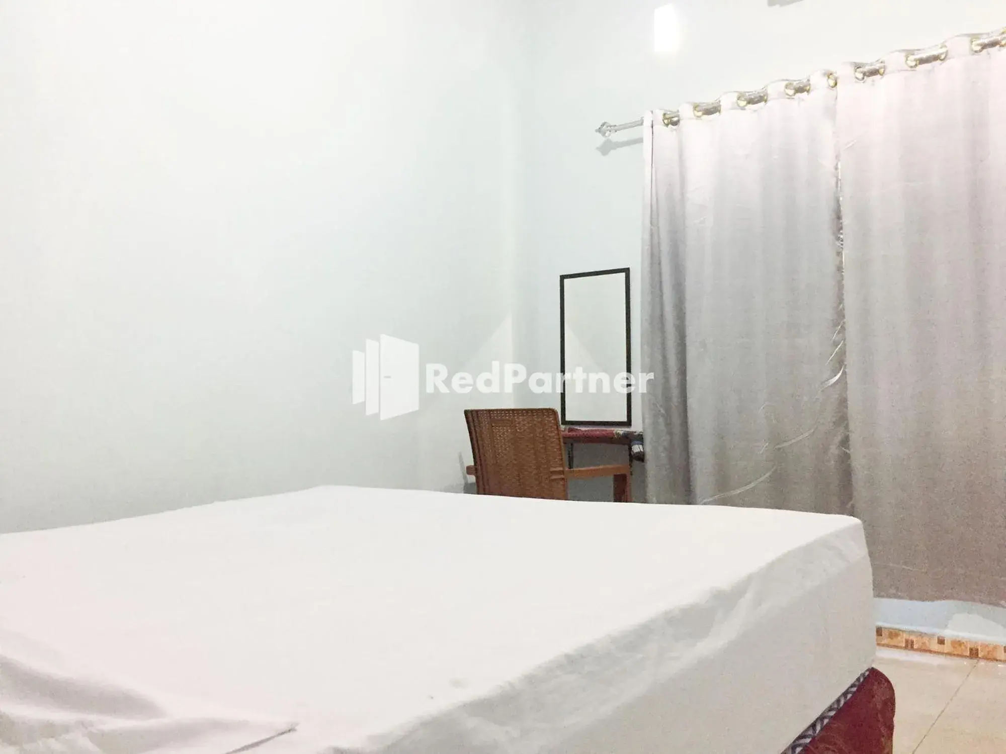 Bed in Wisma Andini Palopo RedPartner Bed in Wisma Andini Palopo RedPartner