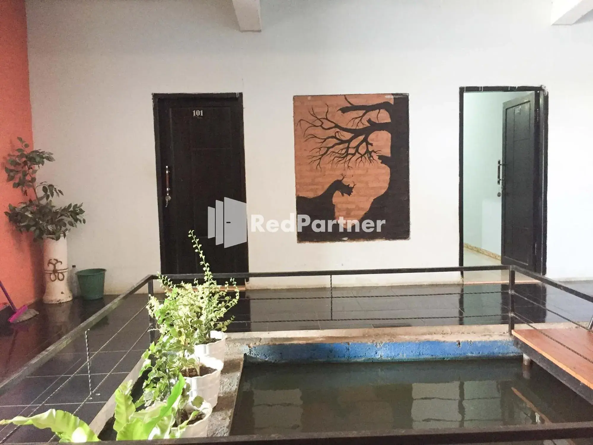 Facade/entrance in Wisma Andini Palopo RedPartner Facade/entrance in Wisma Andini Palopo RedPartner