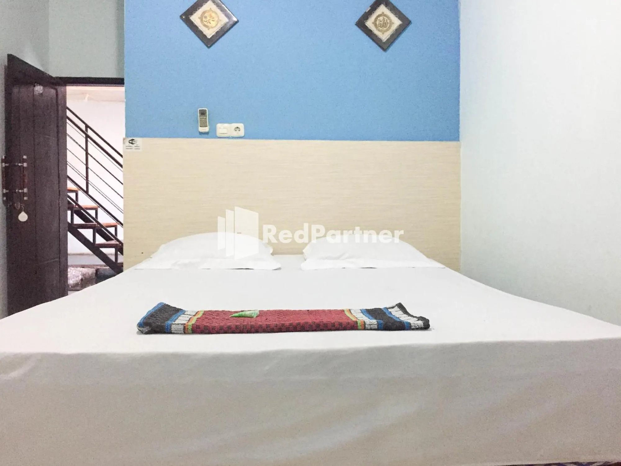 Bed in Wisma Andini Palopo RedPartner