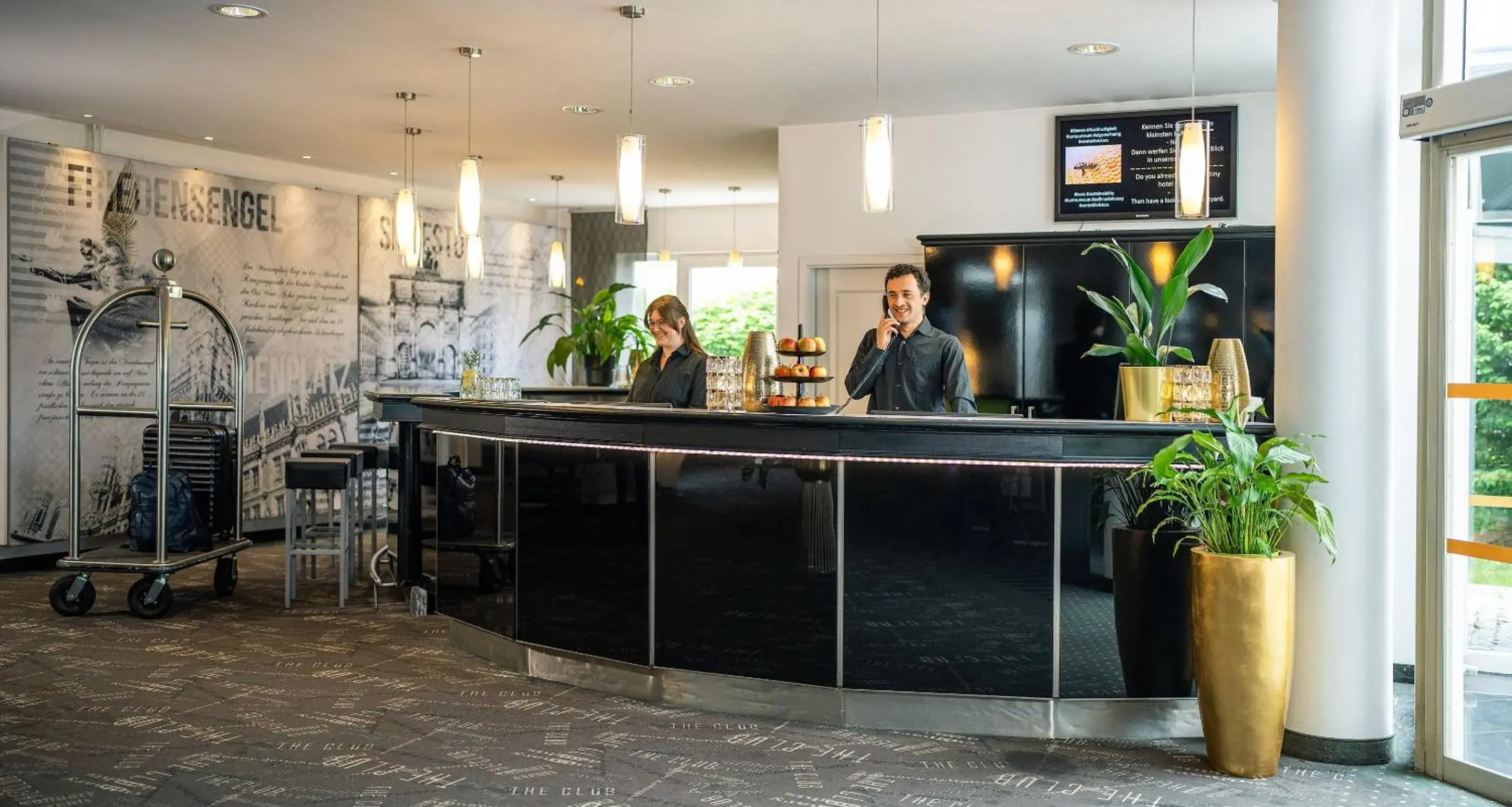 Lobby or reception in Victor's Residenz-Hotel München Lobby or reception in Victor's Residenz-Hotel München