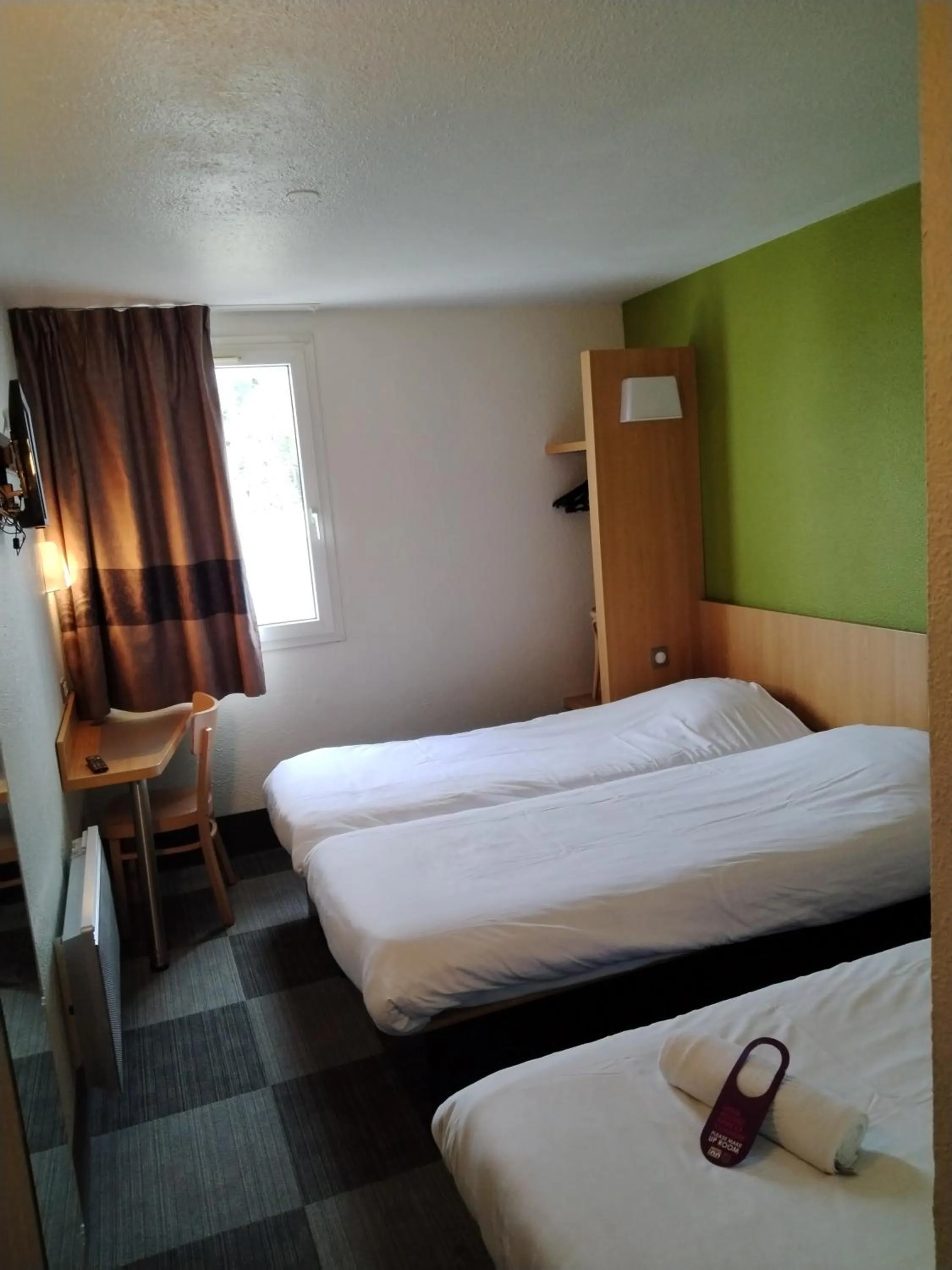 Photo of the whole room, Bed in Hotel Inn Design Montluçon
