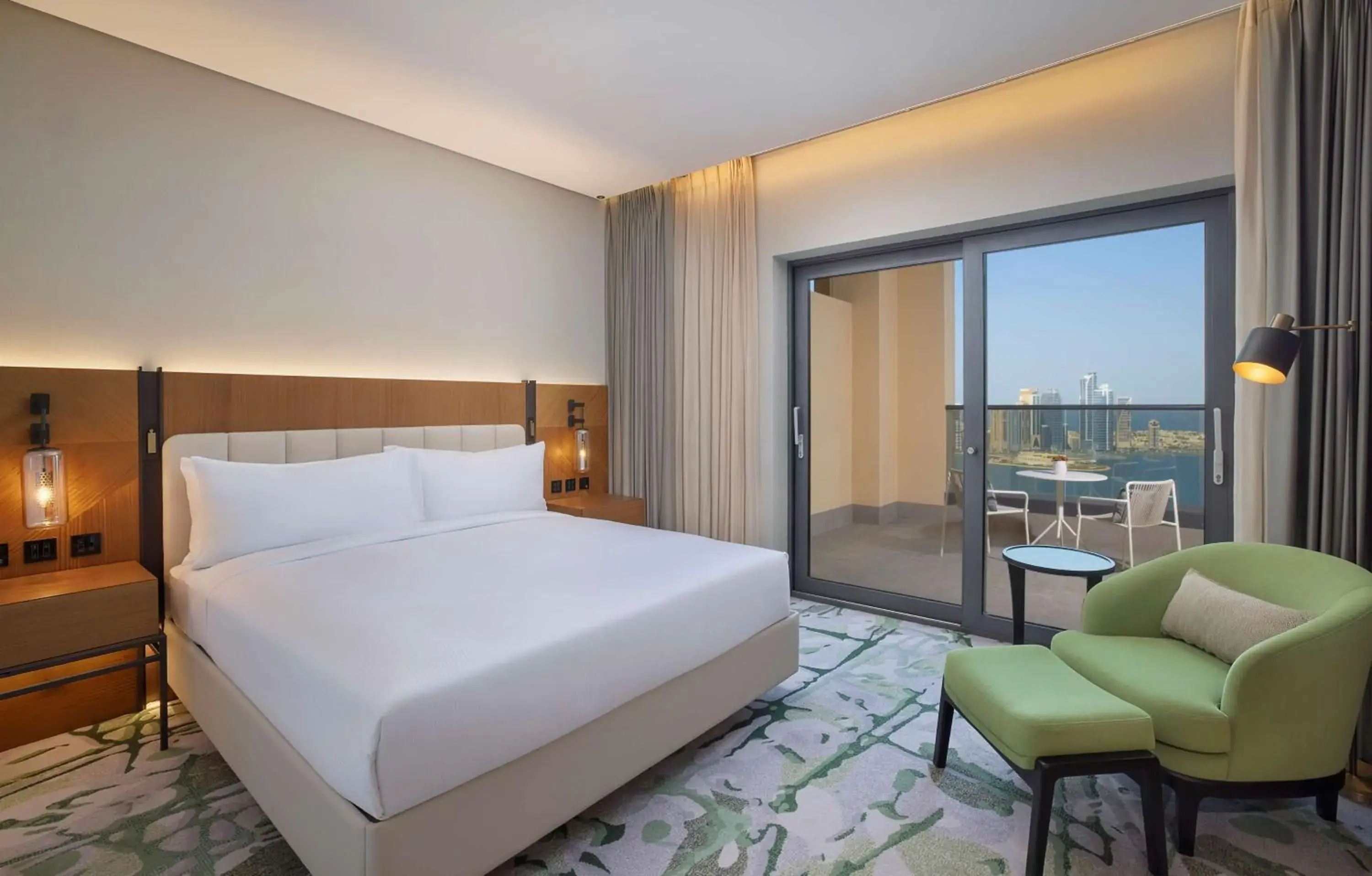 Living room, Bed in DoubleTree by Hilton Sharjah Waterfront Hotel And Residences Living room, Bed in DoubleTree by Hilton Sharjah Waterfront Hotel And Residences