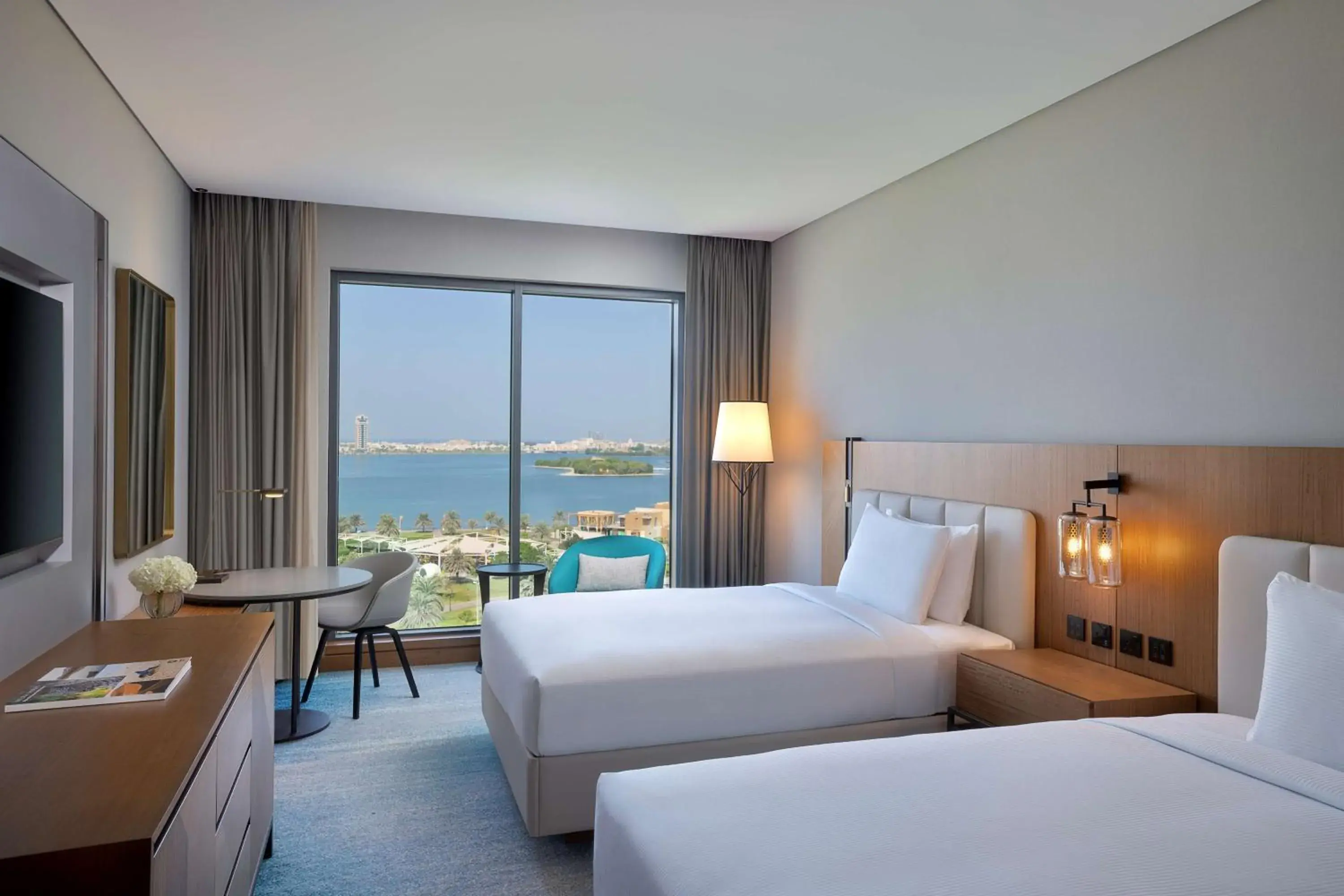 Bed in DoubleTree by Hilton Sharjah Waterfront Hotel And Residences Bed in DoubleTree by Hilton Sharjah Waterfront Hotel And Residences