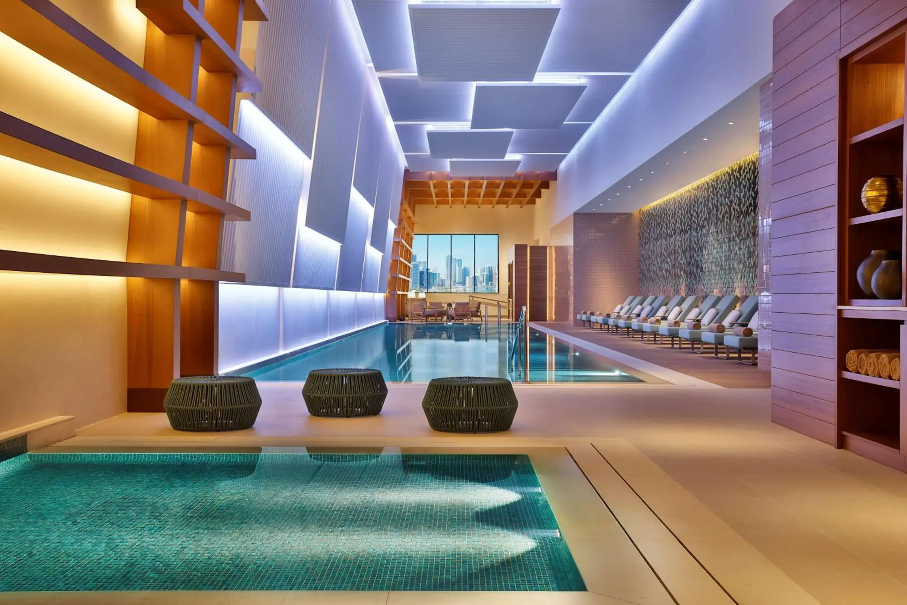 Pool view in DoubleTree by Hilton Sharjah Waterfront Hotel And Residences Pool view in DoubleTree by Hilton Sharjah Waterfront Hotel And Residences