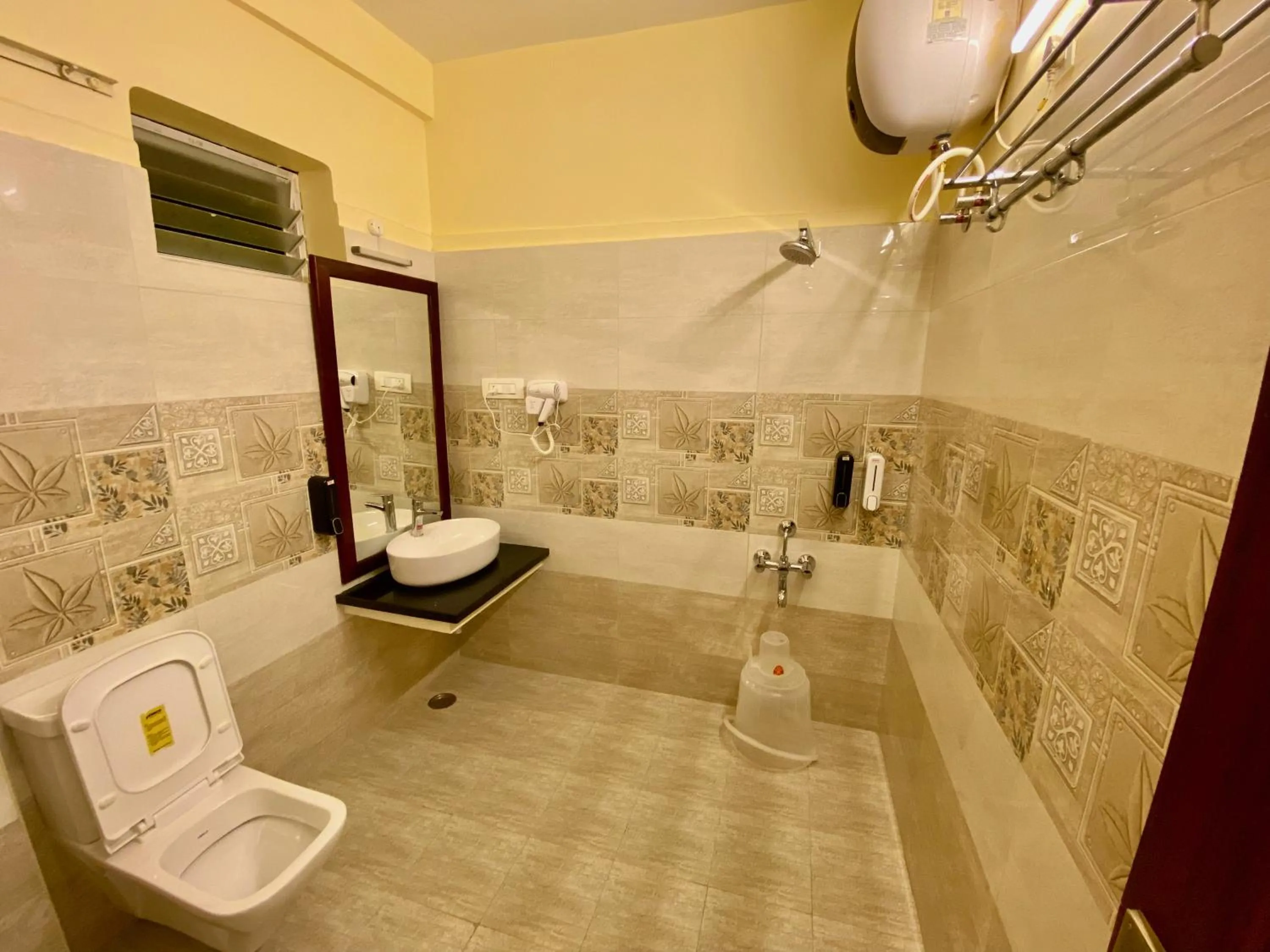 Bathroom in Aakash Rooms and Cottages,