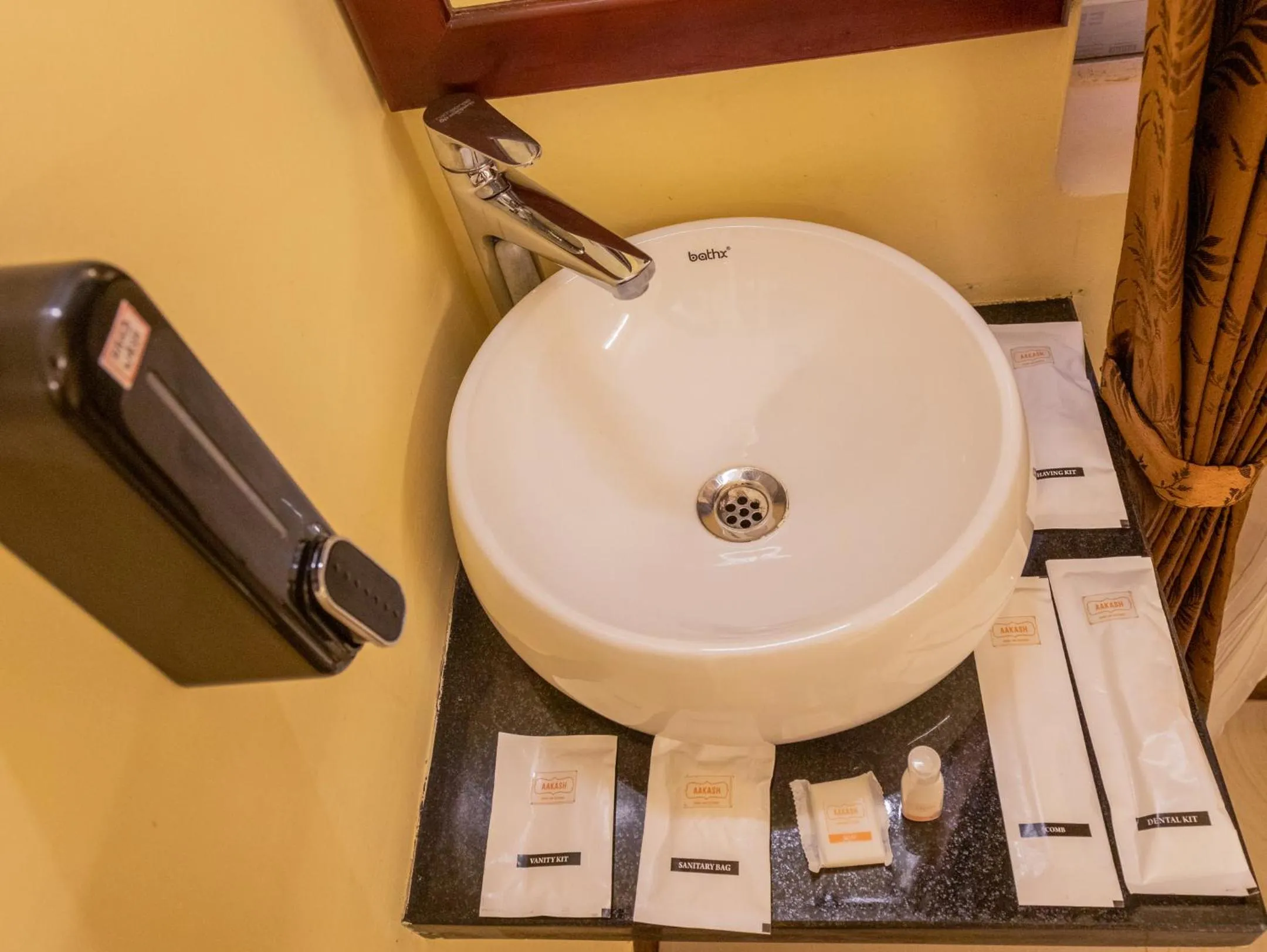 Bathroom in Aakash Rooms and Cottages,
