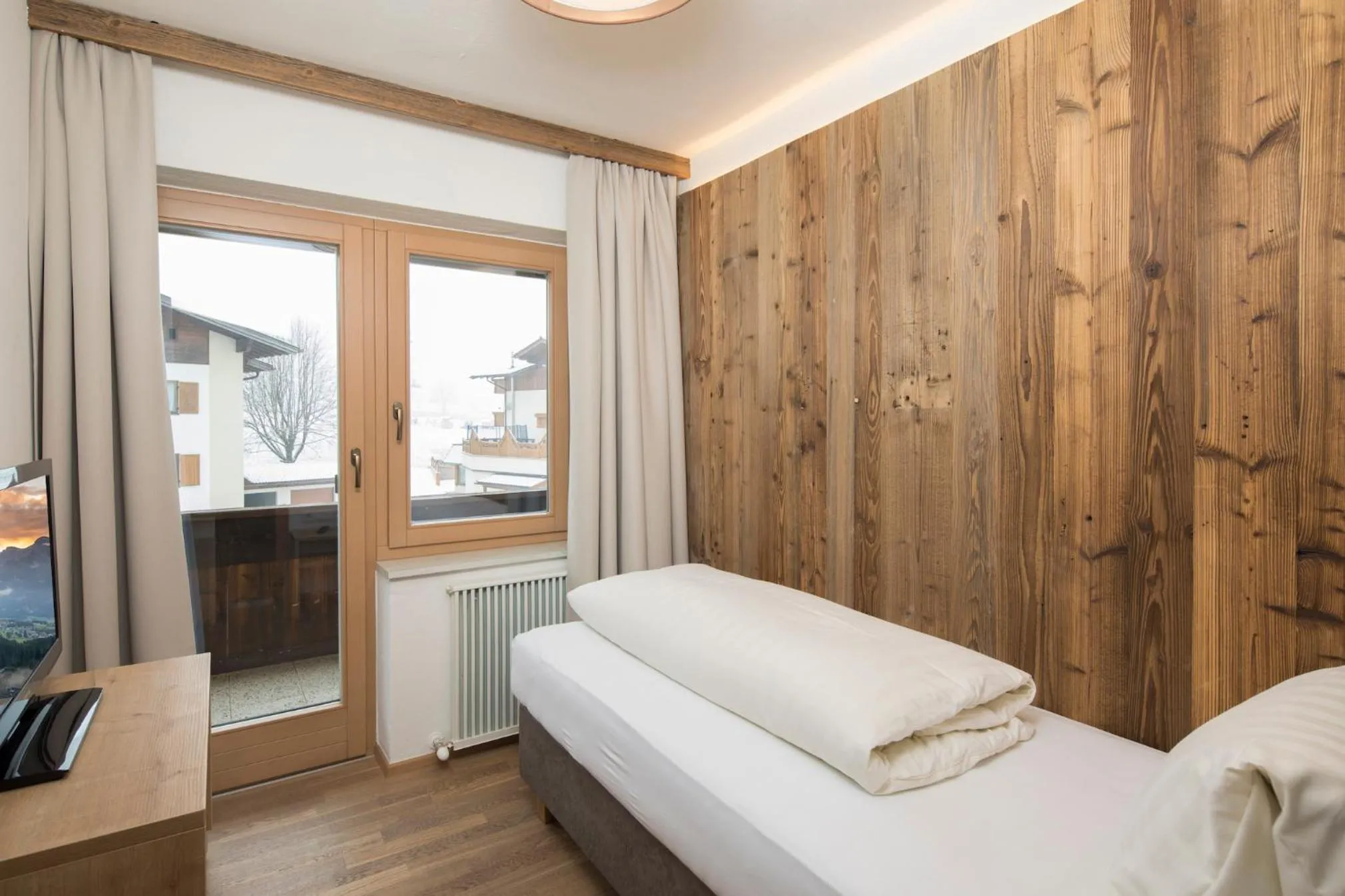 Bed in Angerer Alpine Suiten und Familienappartements Tirol