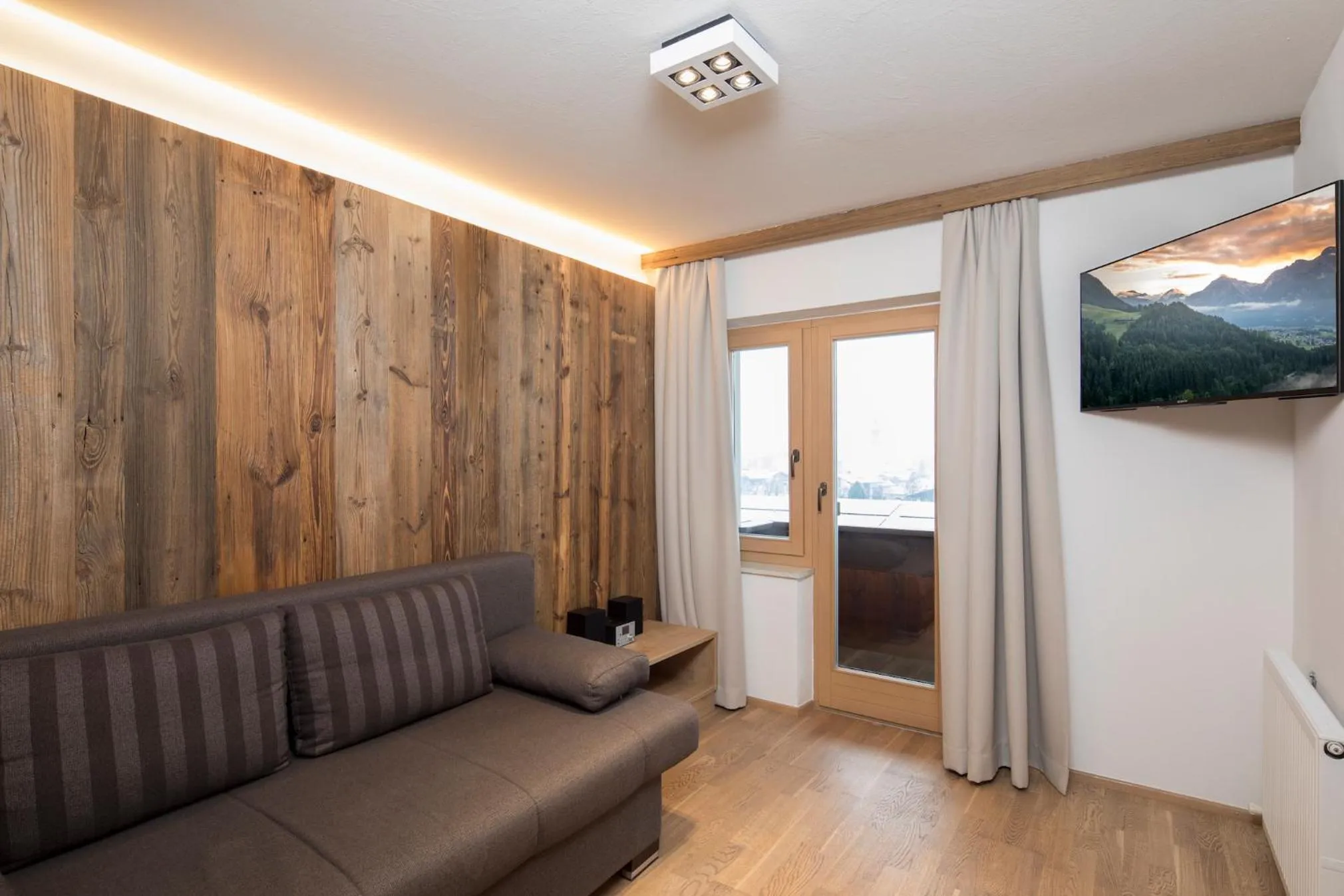 TV and multimedia in Angerer Alpine Suiten und Familienappartements Tirol