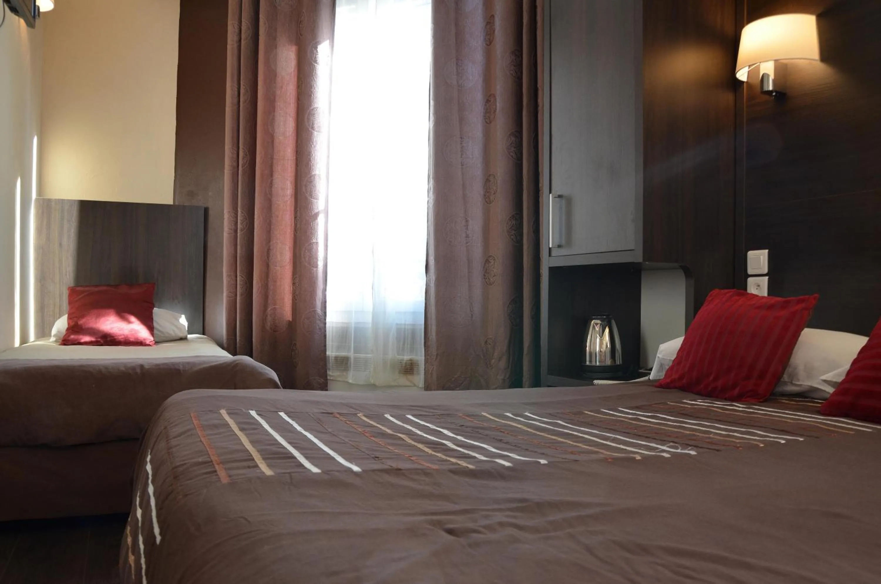 Bed in Hôtel du Parc