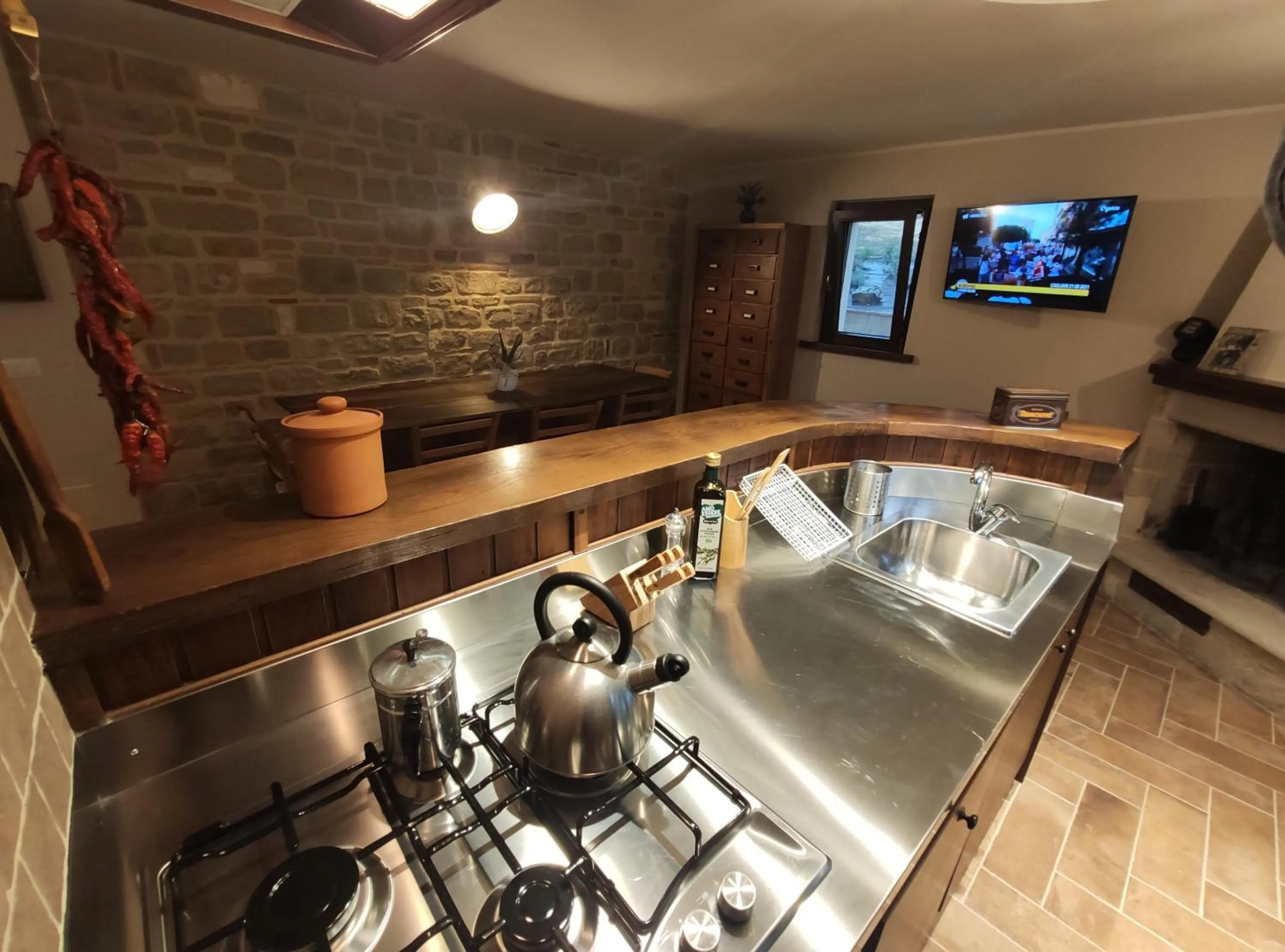 Communal kitchen in B&B il Fienile