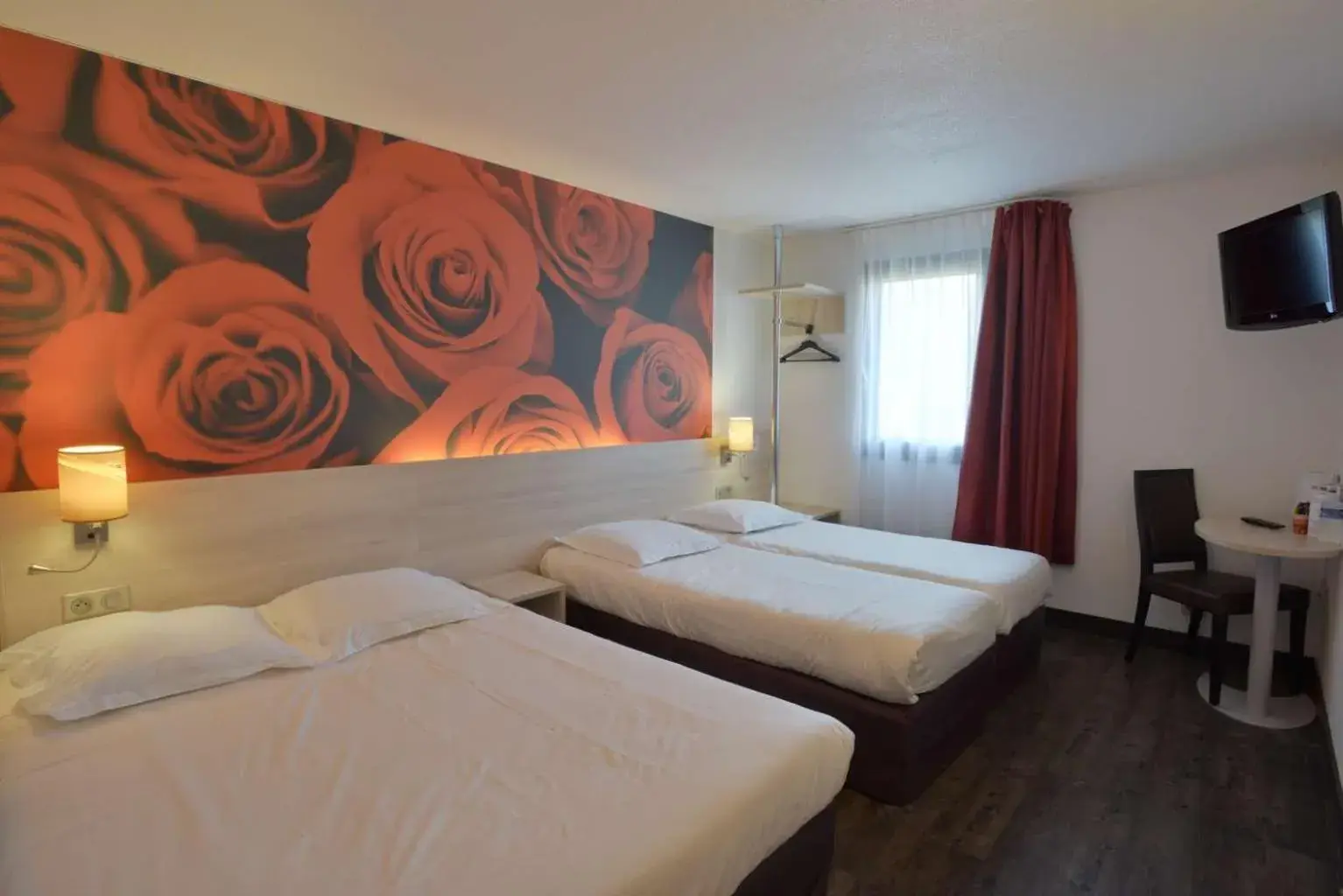 Bedroom, Bed in Brit Hotel Essentiel de Granville Bedroom, Bed in Brit Hotel Essentiel de Granville