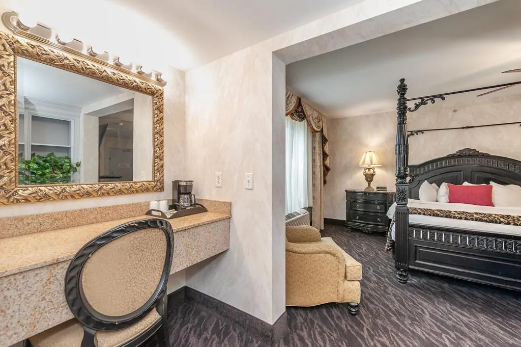 Seating area, Bed in Bellissimo Hotel, Trademark by Wyndham Near Foxwoods Casino