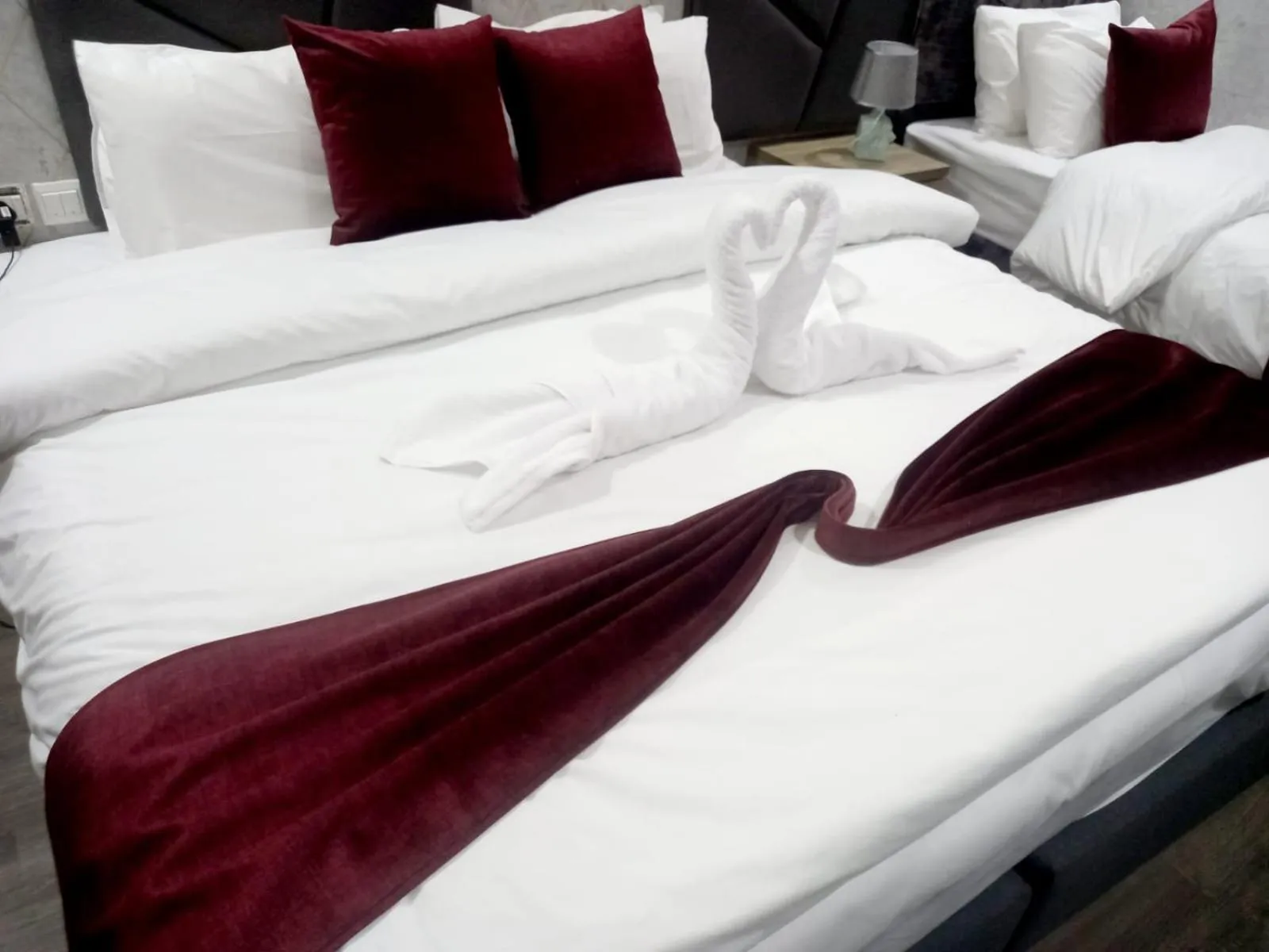 Bed in Twins Downtown Hotel