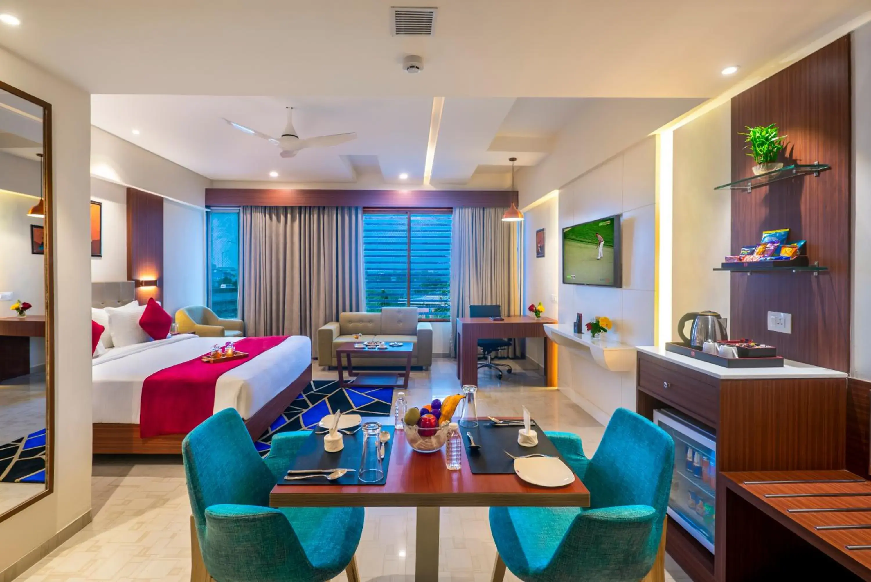 Seating area, Bed in Lords Eco Inn Shapar Rajkot Seating area, Bed in Lords Eco Inn Shapar Rajkot