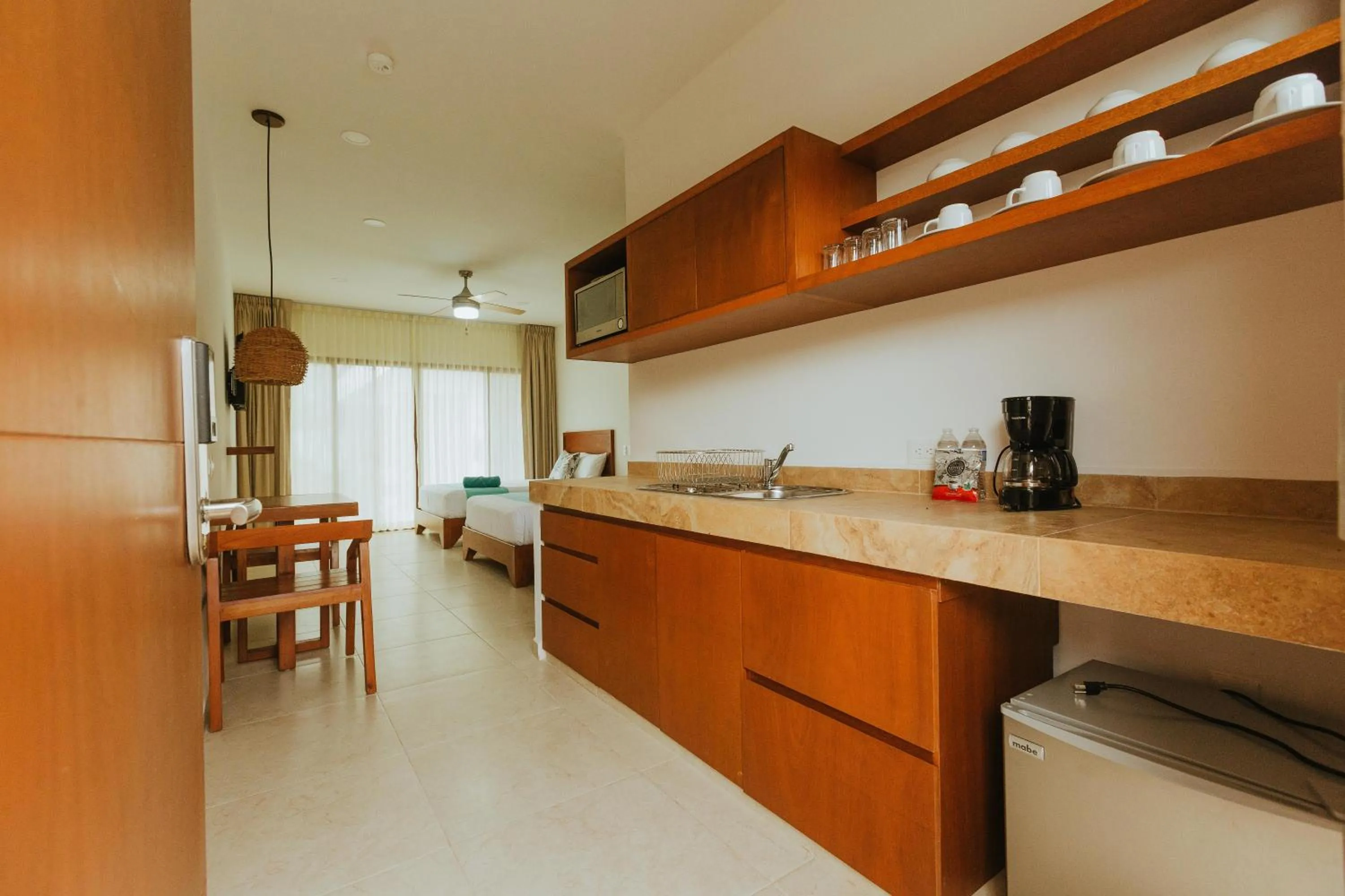 Kitchen or kitchenette in Hotel Boutique Naj Casa Holbox