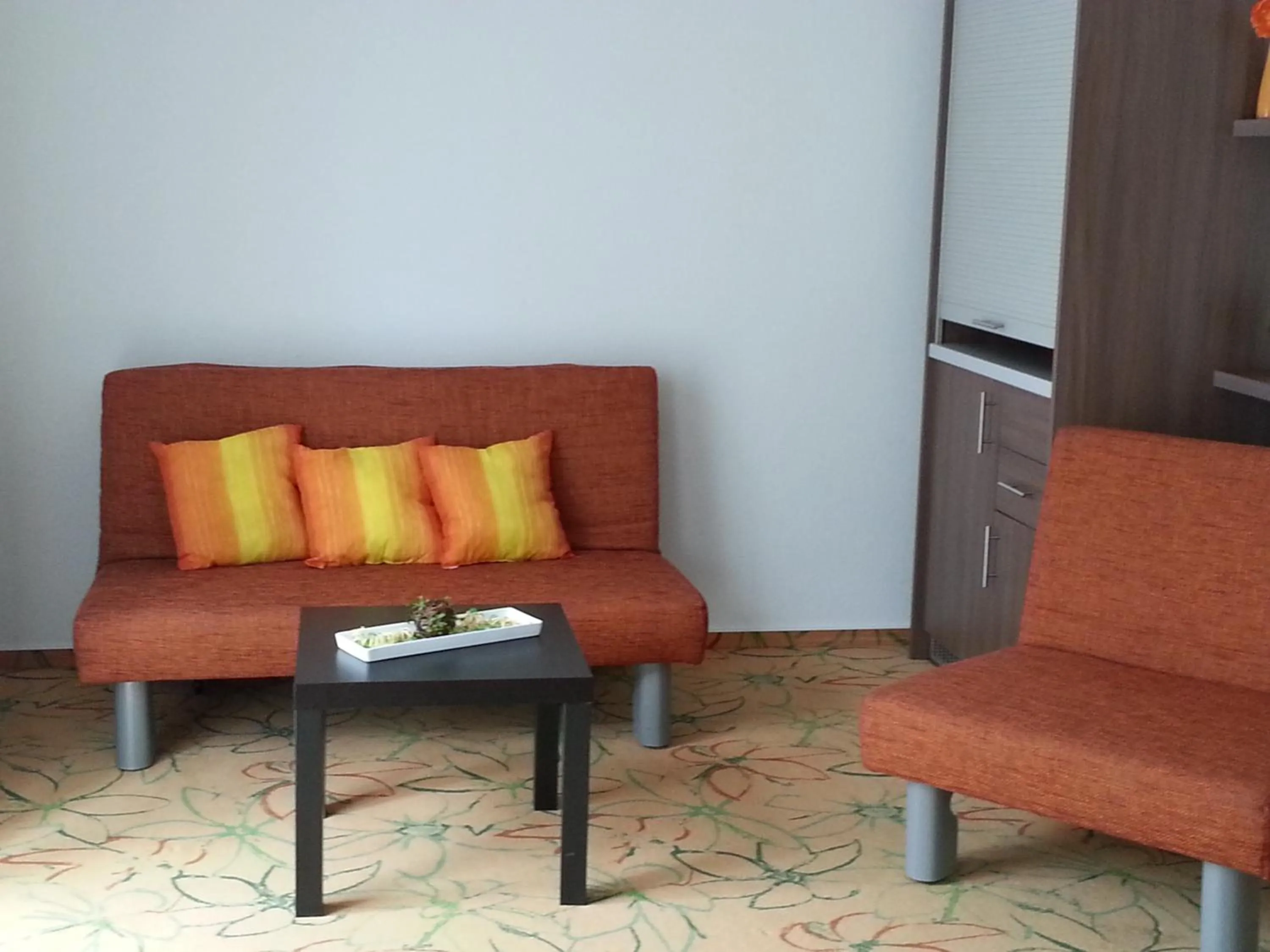 Seating area in Hotel AVIVA by APOLONIA