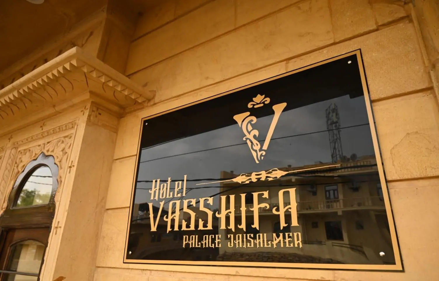 Property logo or sign in Hotel Vasshifa Palace
