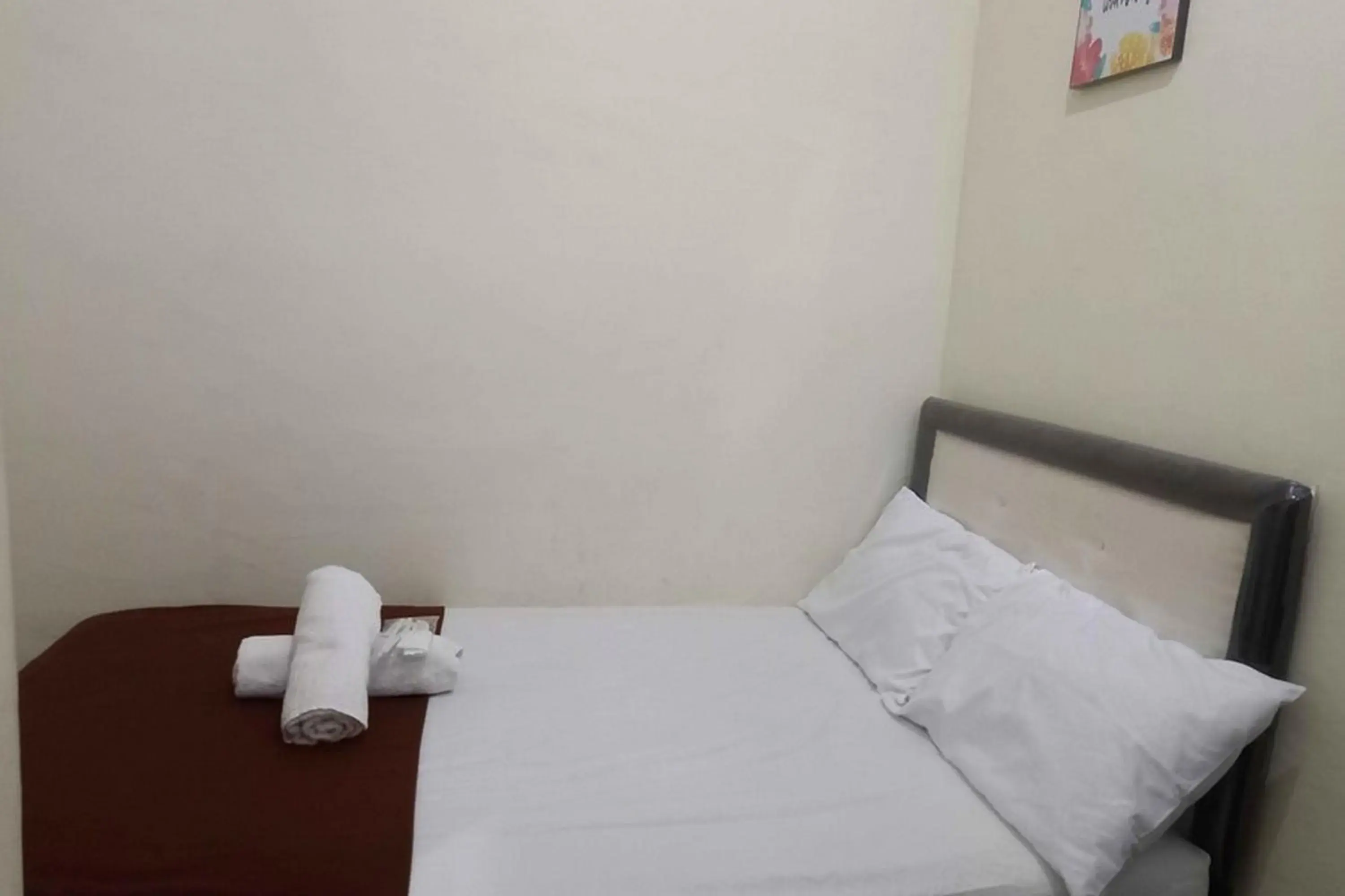 Bed in Omah Jaban Jogja Mitra RedDoorz Bed in Omah Jaban Jogja Mitra RedDoorz