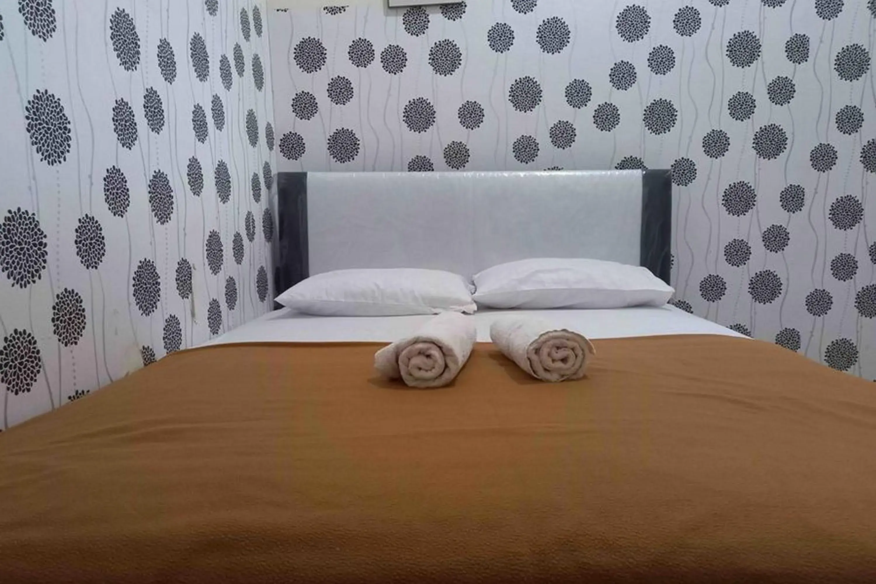 Bed in Omah Jaban Jogja Mitra RedDoorz Bed in Omah Jaban Jogja Mitra RedDoorz