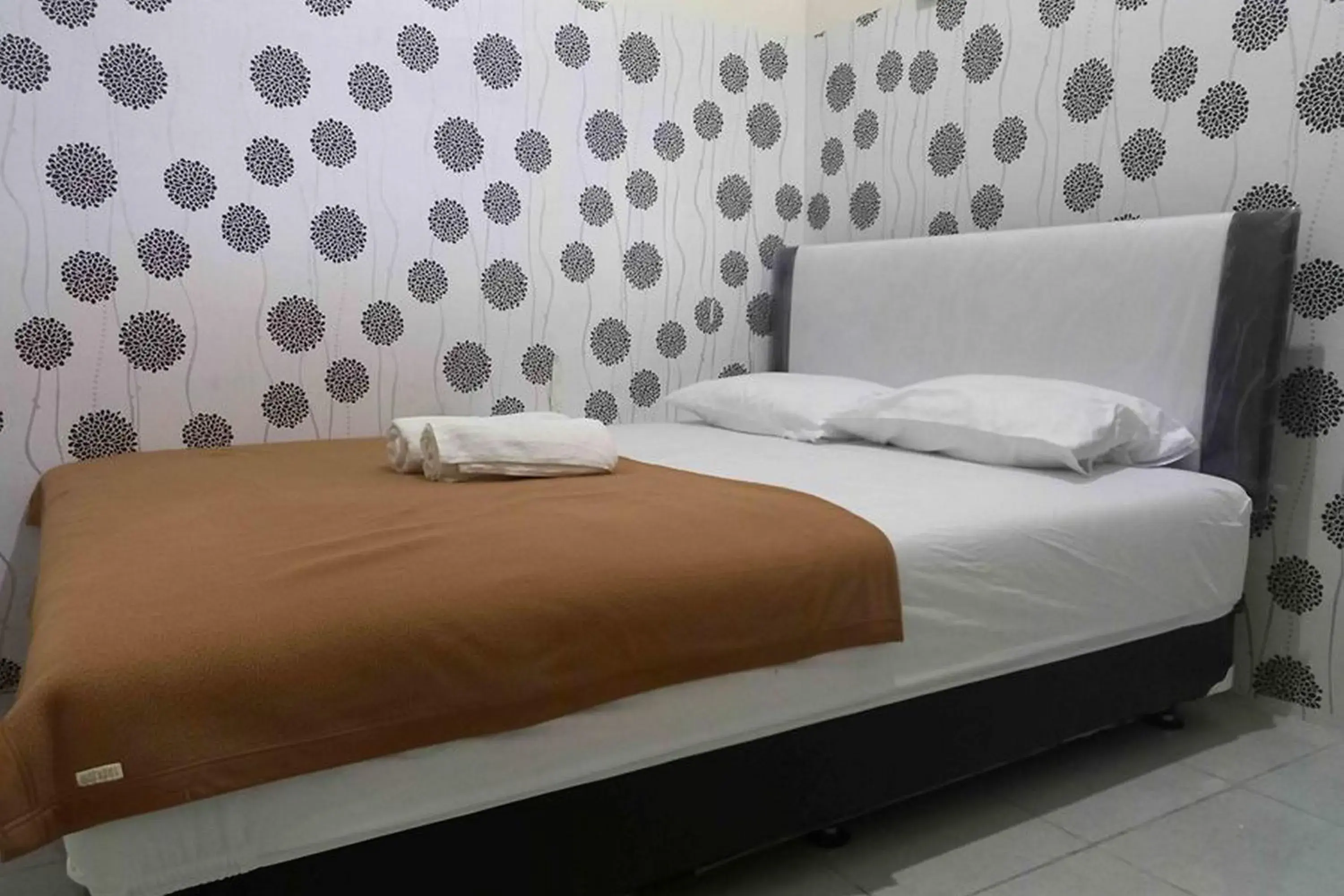 Bed in Omah Jaban Jogja Mitra RedDoorz Bed in Omah Jaban Jogja Mitra RedDoorz