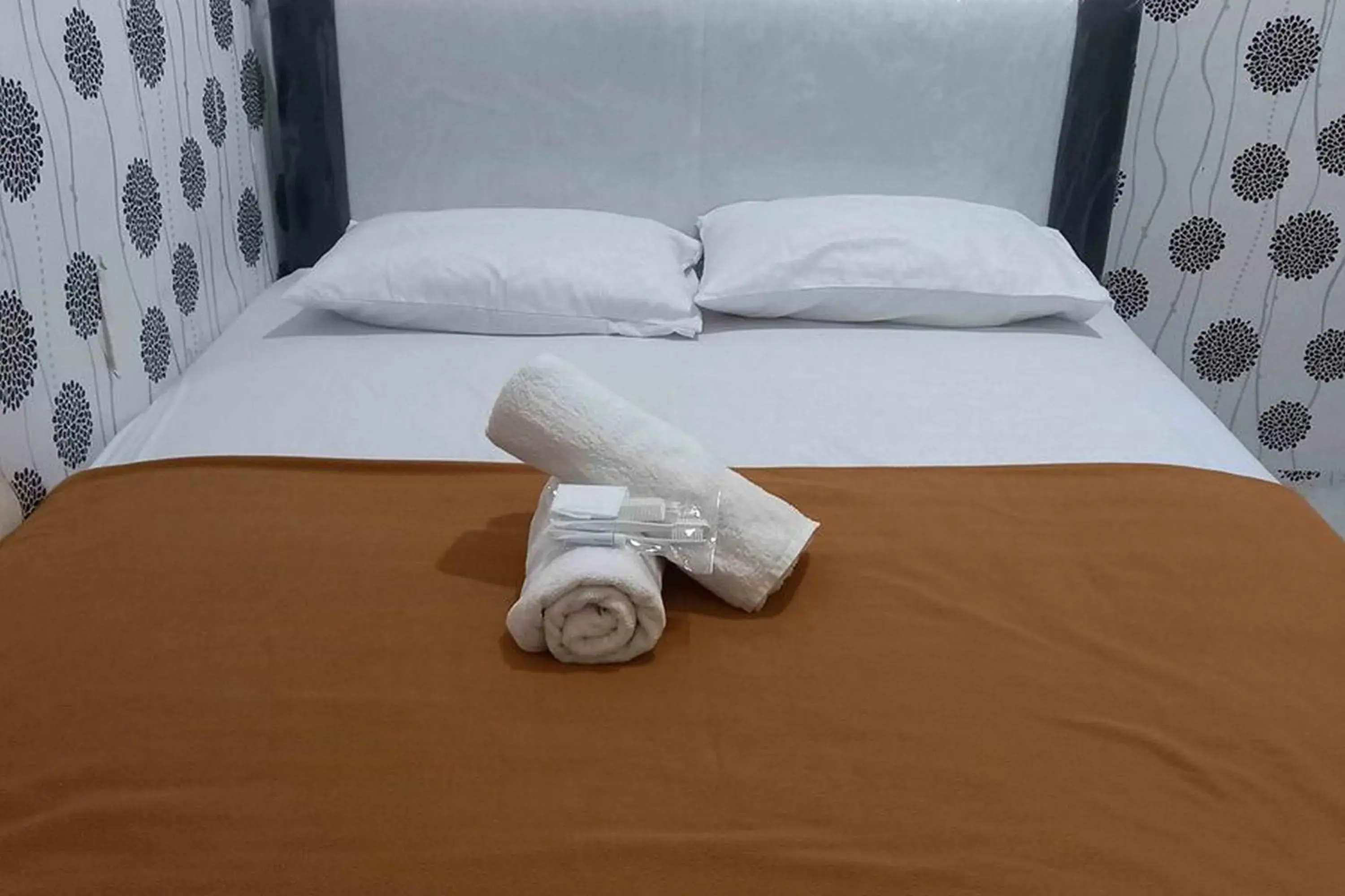 Bed in Omah Jaban Jogja Mitra RedDoorz Bed in Omah Jaban Jogja Mitra RedDoorz