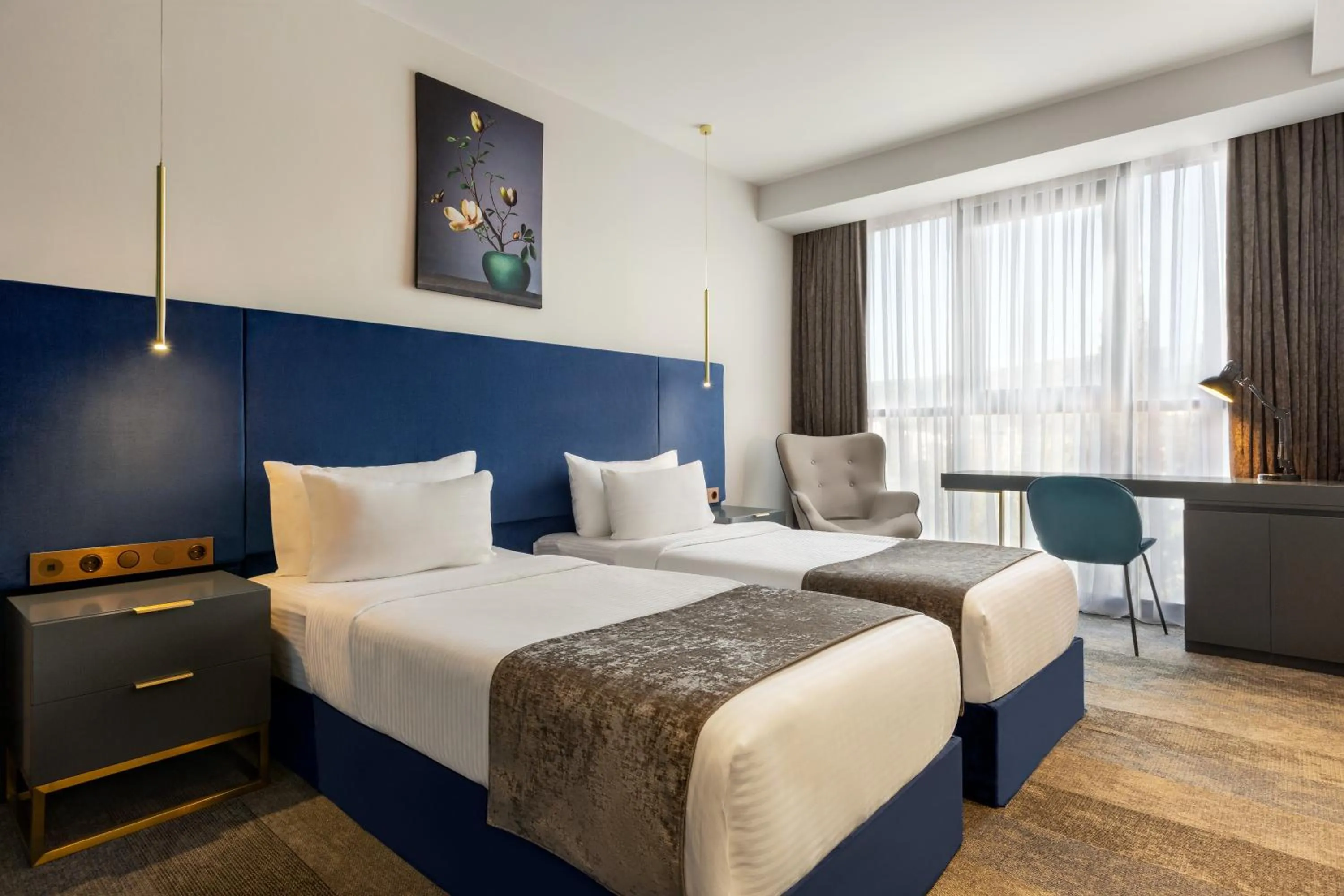Bed in Ramada by Wyndham Tbilisi Old City