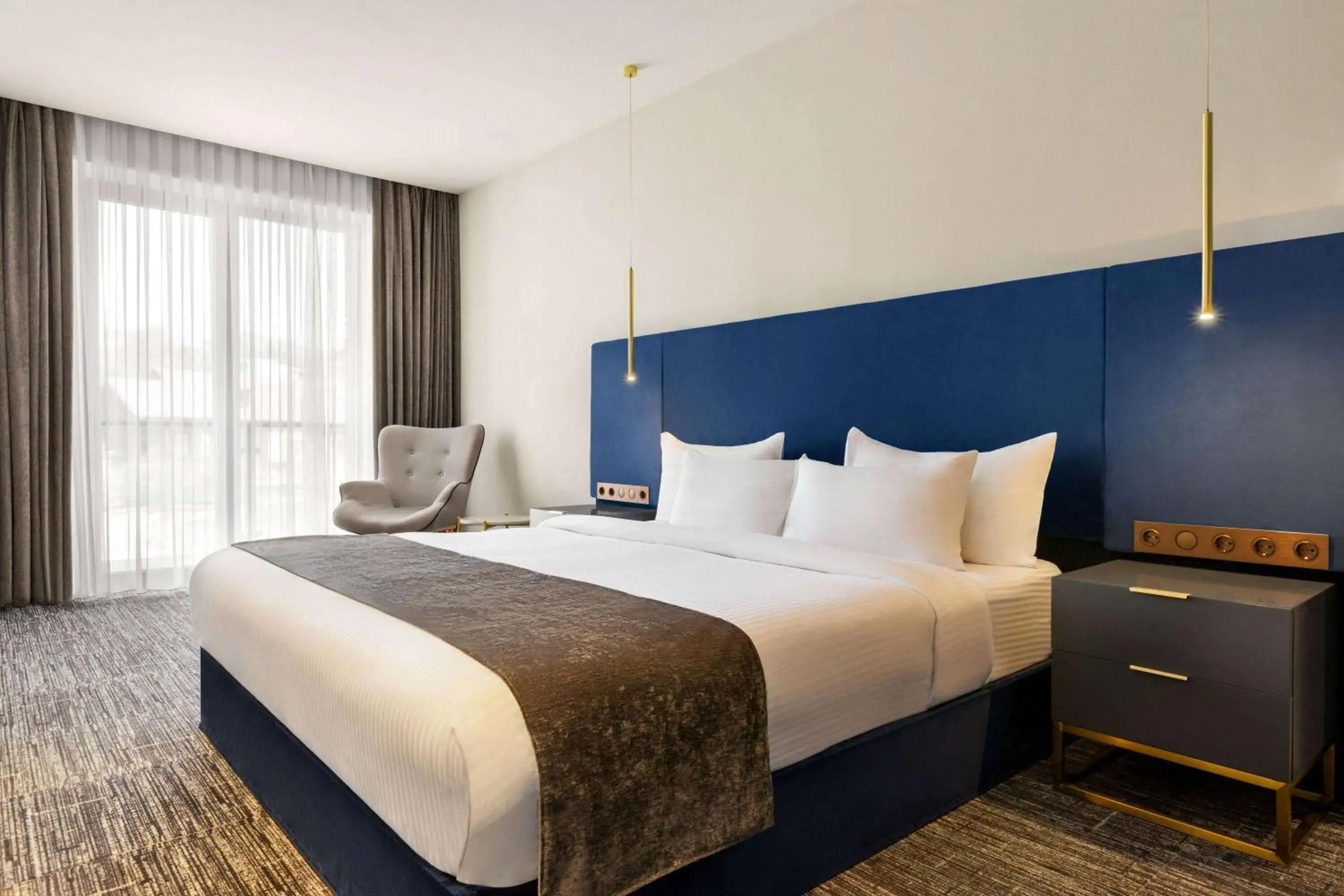 Photo of the whole room, Bed in Ramada by Wyndham Tbilisi Old City Photo of the whole room, Bed in Ramada by Wyndham Tbilisi Old City