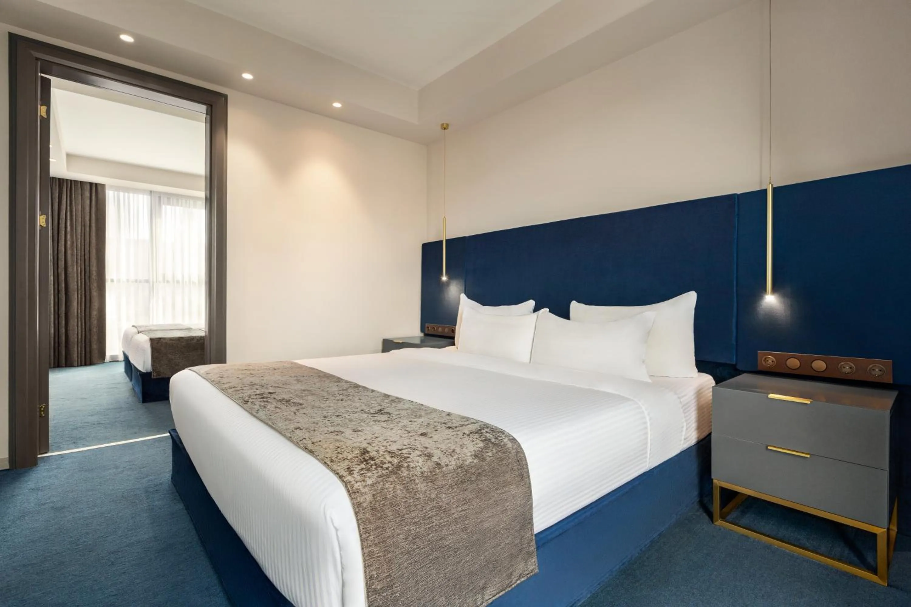 Bed in Ramada by Wyndham Tbilisi Old City