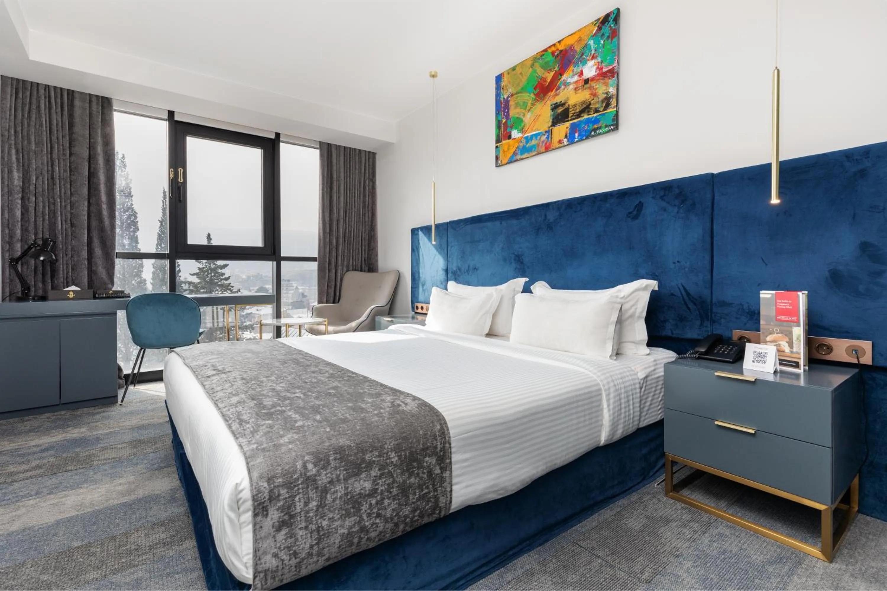 Bed in Ramada by Wyndham Tbilisi Old City