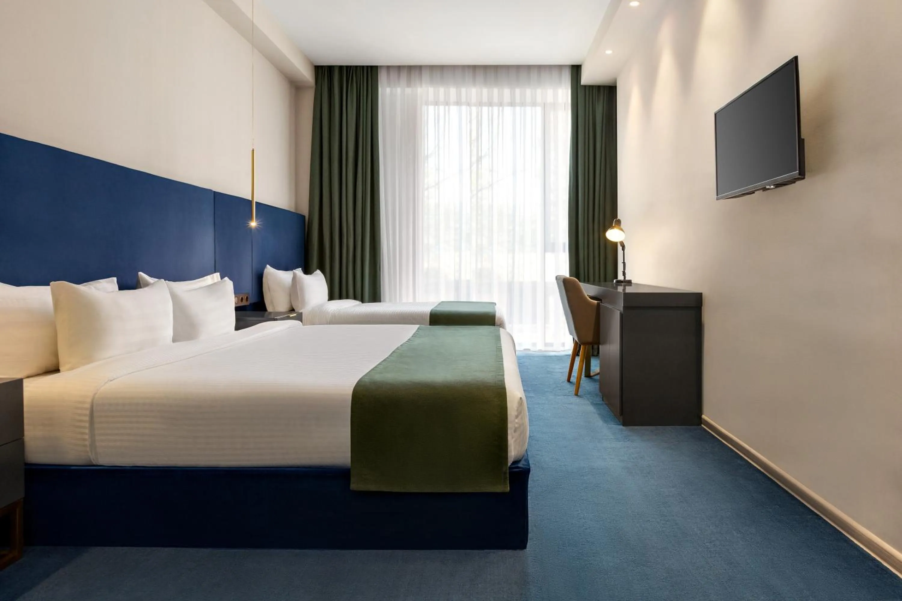 Bed in Ramada by Wyndham Tbilisi Old City