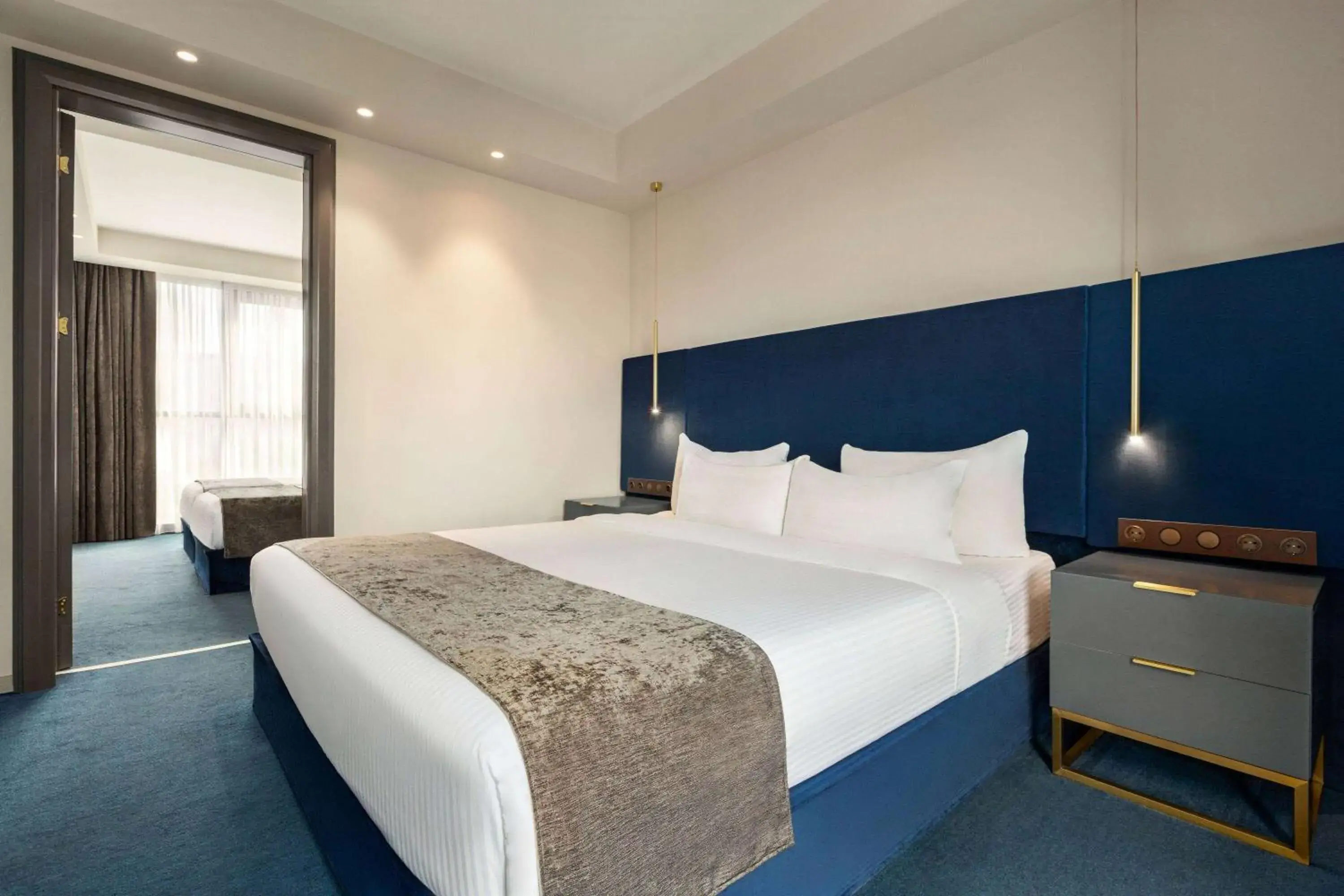 Photo of the whole room, Bed in Ramada by Wyndham Tbilisi Old City Photo of the whole room, Bed in Ramada by Wyndham Tbilisi Old City