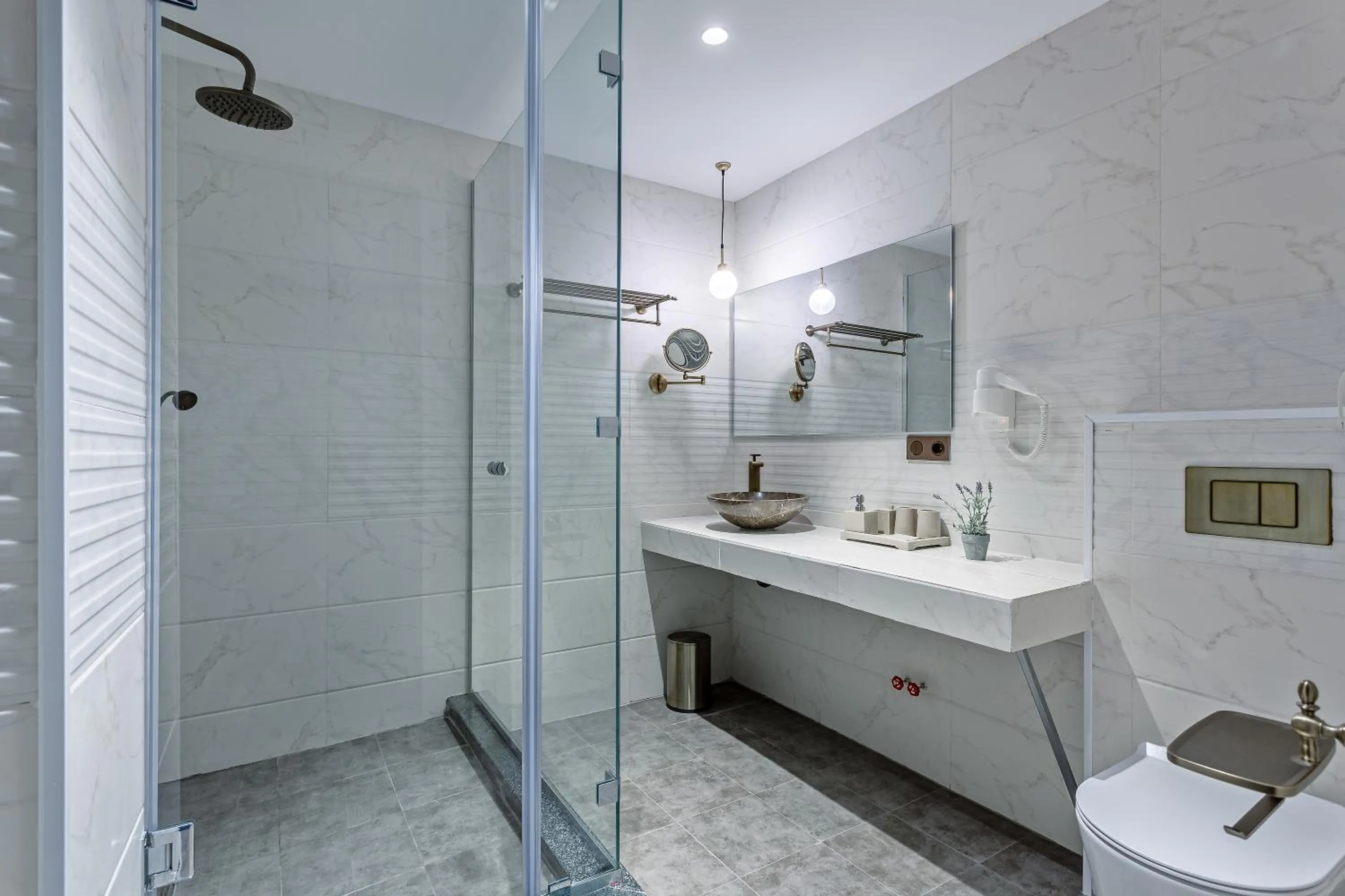 Shower in Ramada by Wyndham Tbilisi Old City