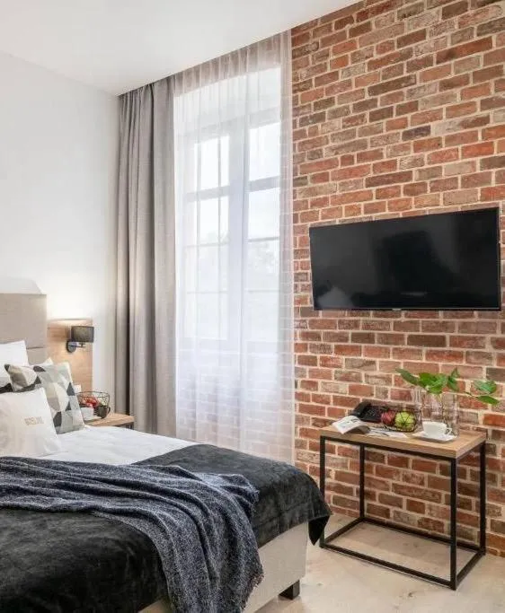 Bed in Hotel Jazz Market Square Wroclaw