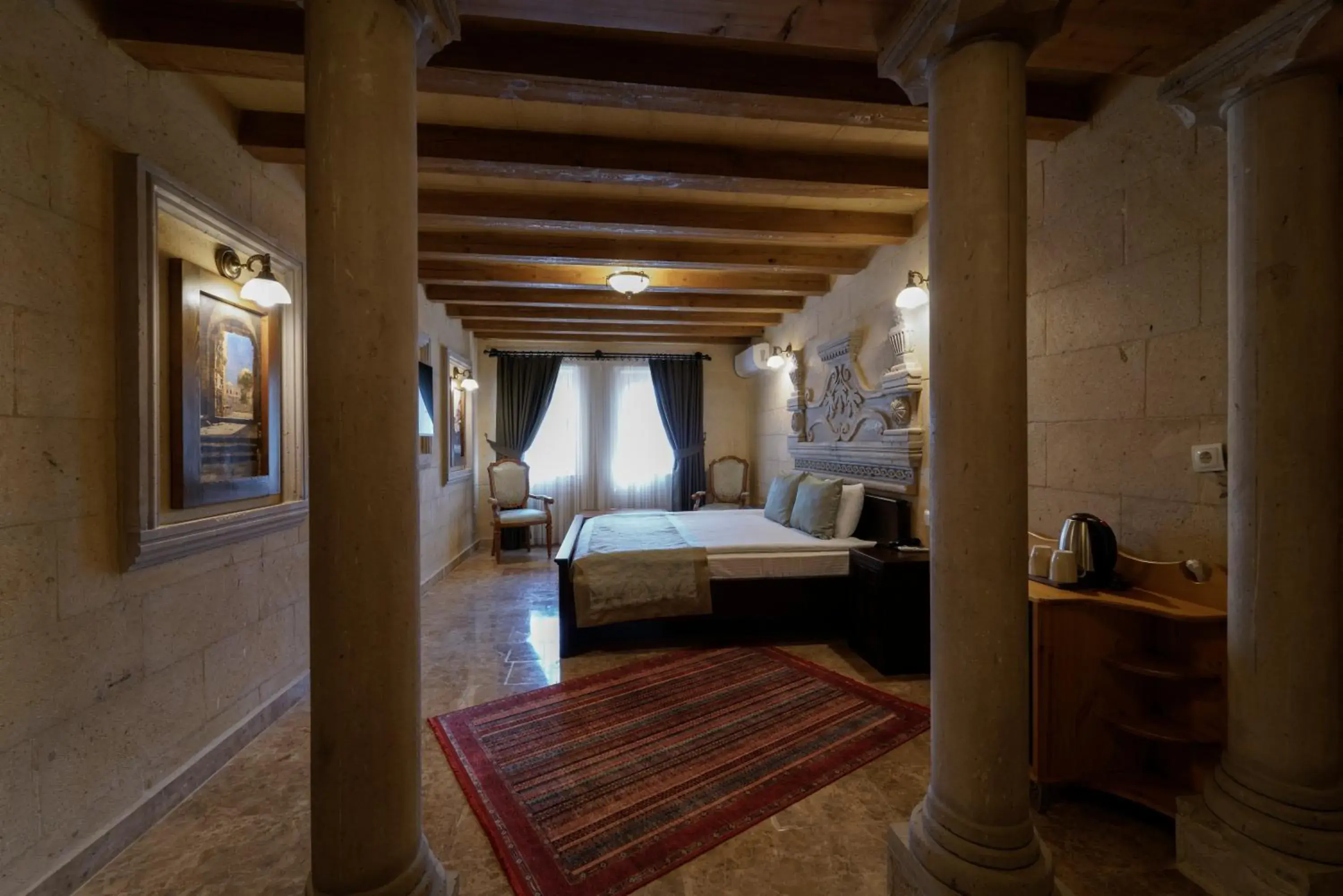 Seating area, Bed in Cratus Stone Palace Seating area, Bed in Cratus Stone Palace