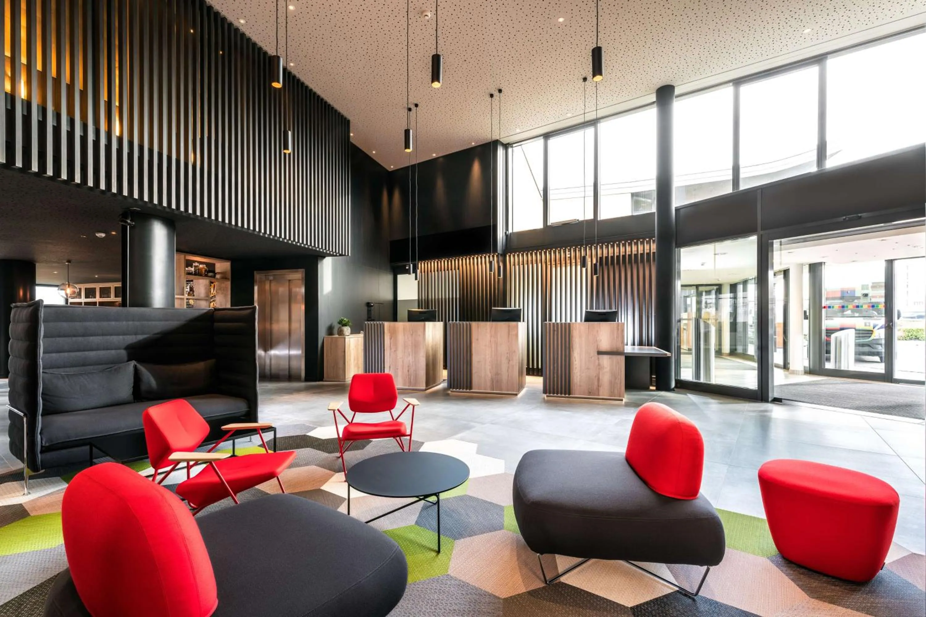 Lobby or reception in Radisson Hotel Zurich Airport