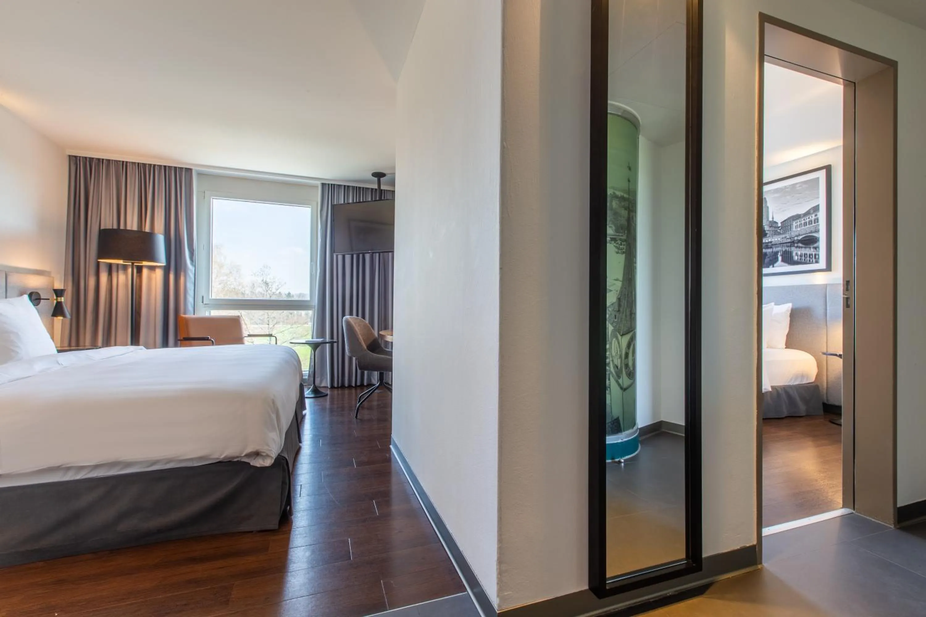 Photo of the whole room, Bed in Radisson Hotel Zurich Airport